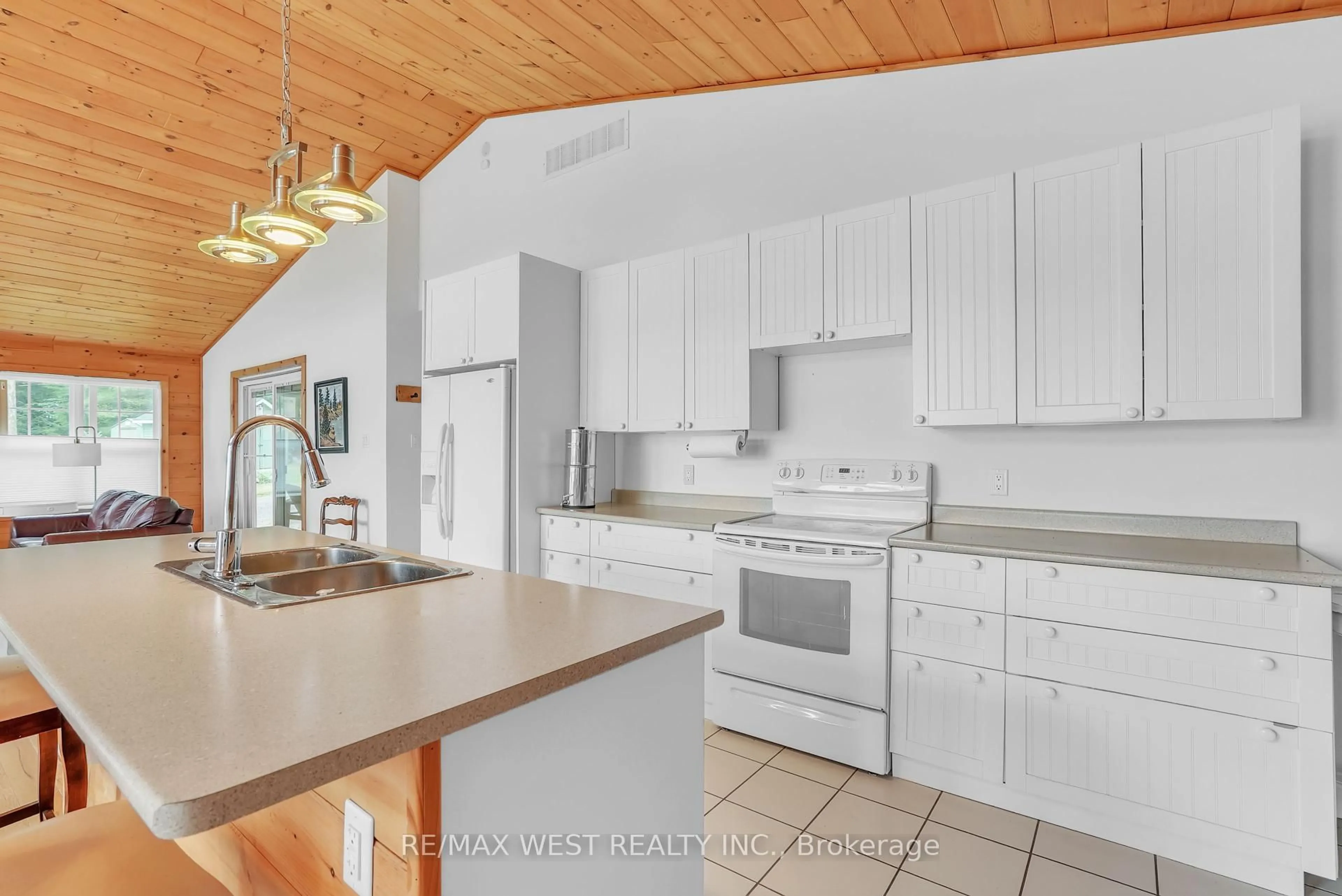 Open concept kitchen, ceramic/tile floor for 2982 Muskoka Road 169, Muskoka Lakes Ontario P0C 1M0