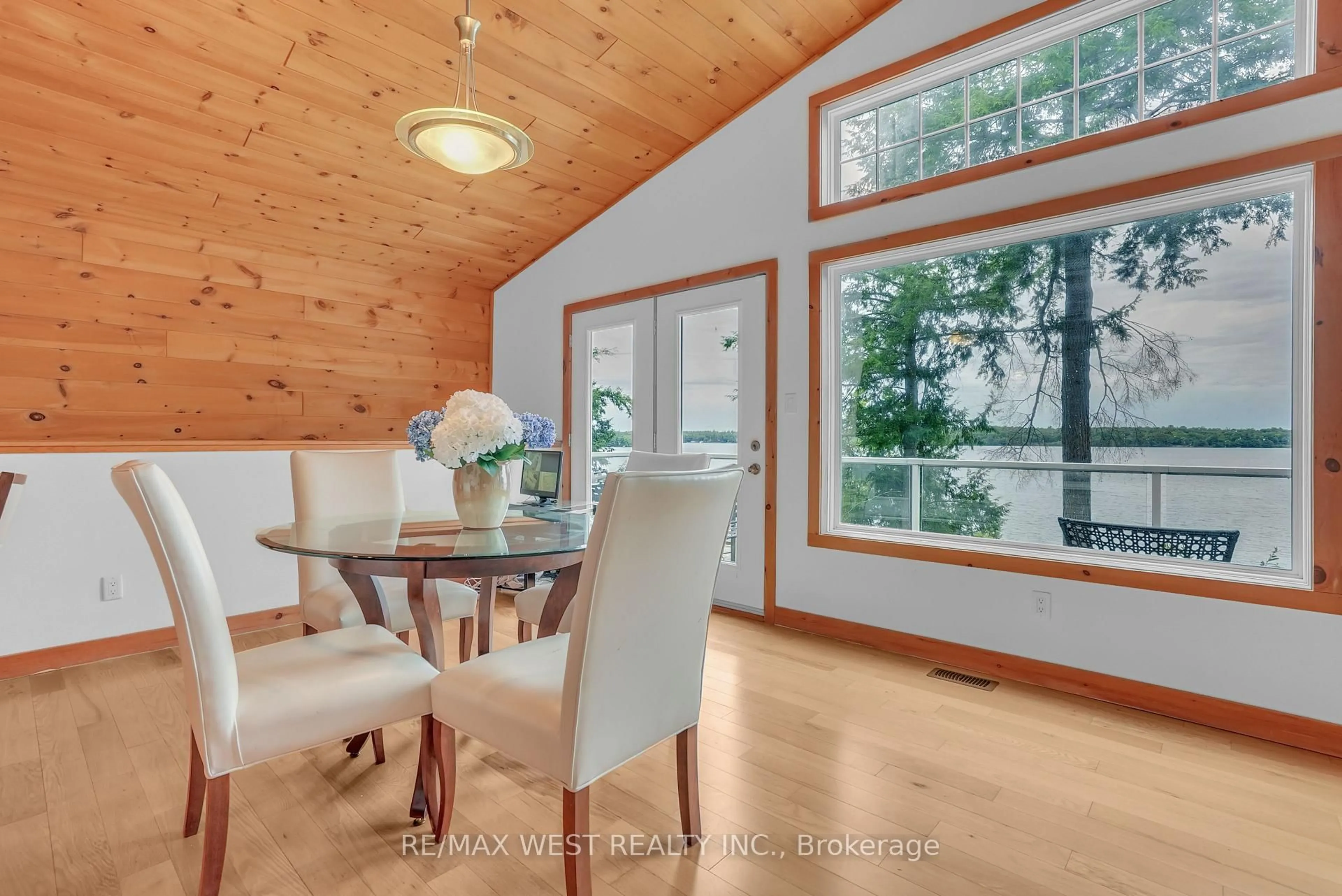 Dining room, wood/laminate floor for 2982 Muskoka Road 169, Muskoka Lakes Ontario P0C 1M0