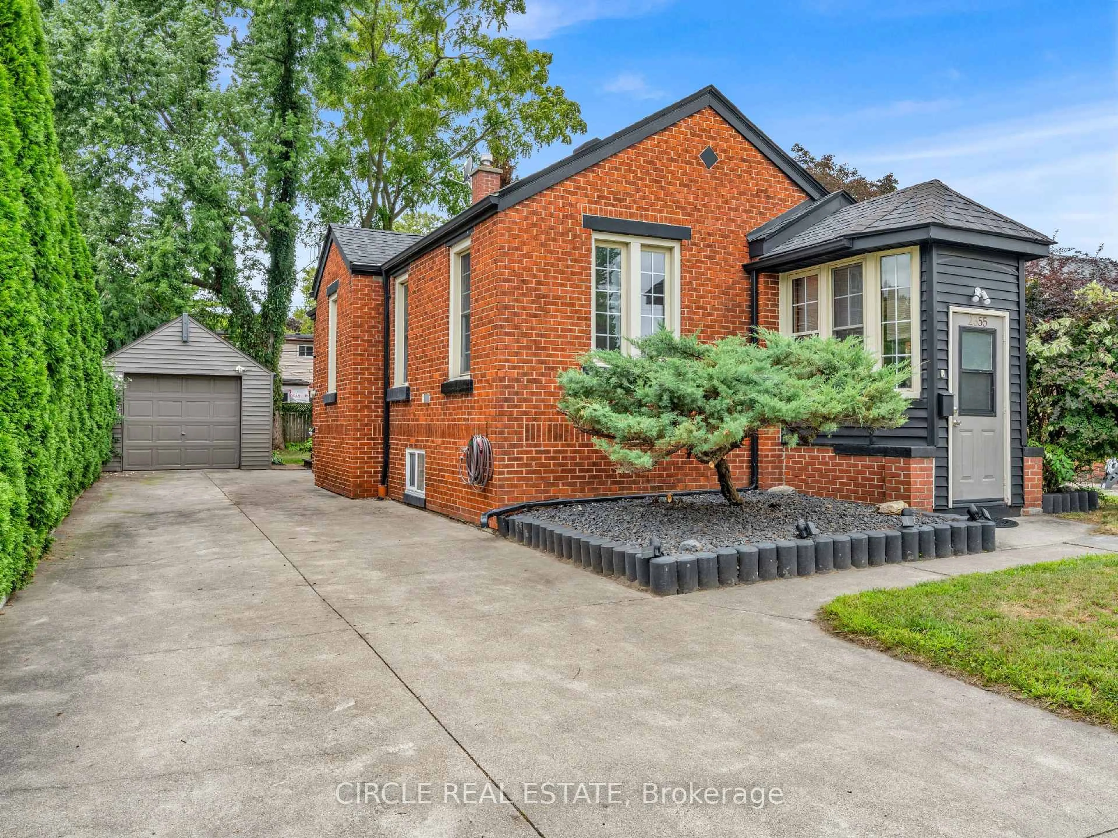 Home with brick exterior material, street for 2355 Rossini Blvd, Windsor Ontario N8W 4P7