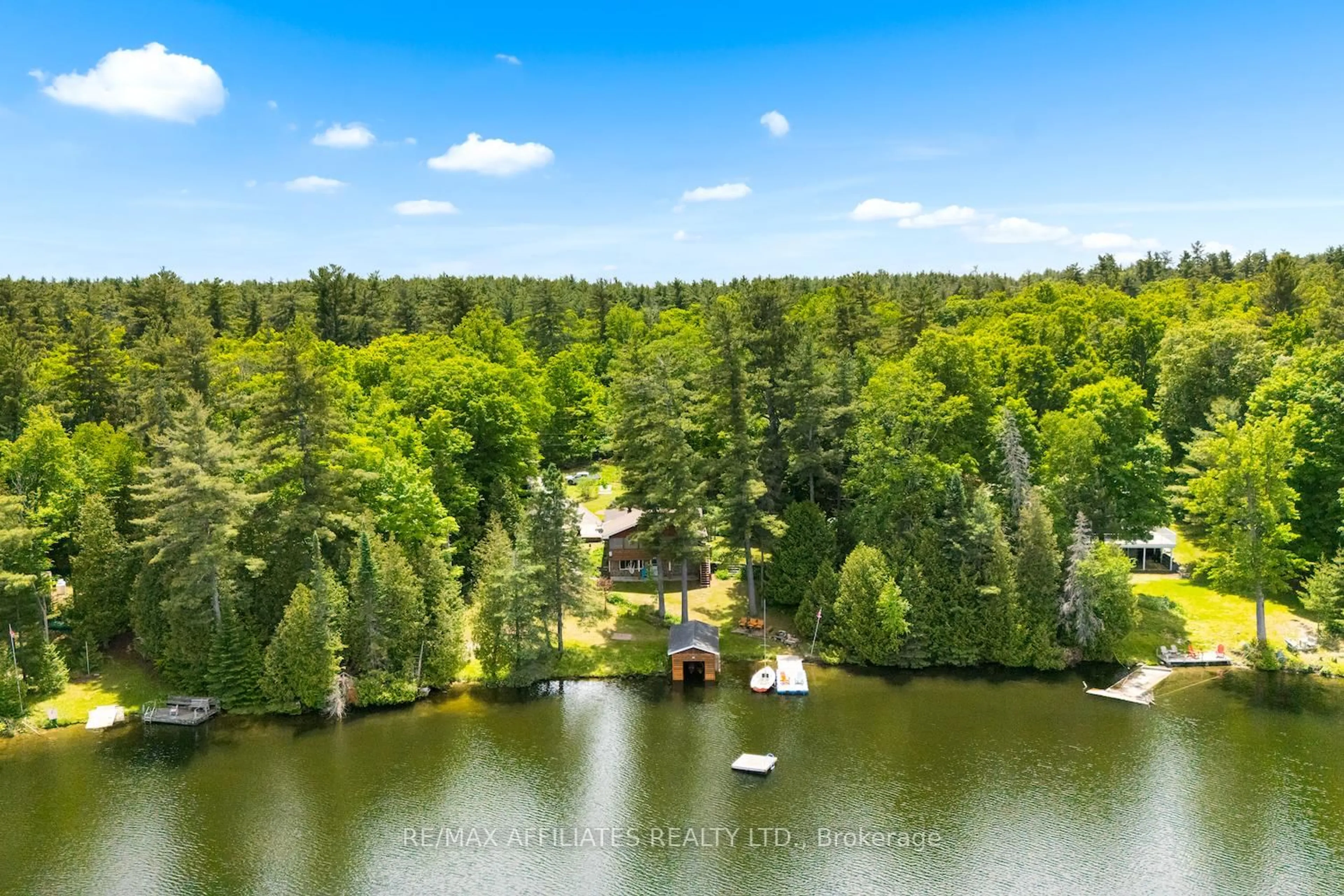 A pic from outside/outdoor area/front of a property/back of a property/a pic from drone, water/lake/river/ocean view for 1094 Snye Rd, White Lake Ontario K0A 3L0