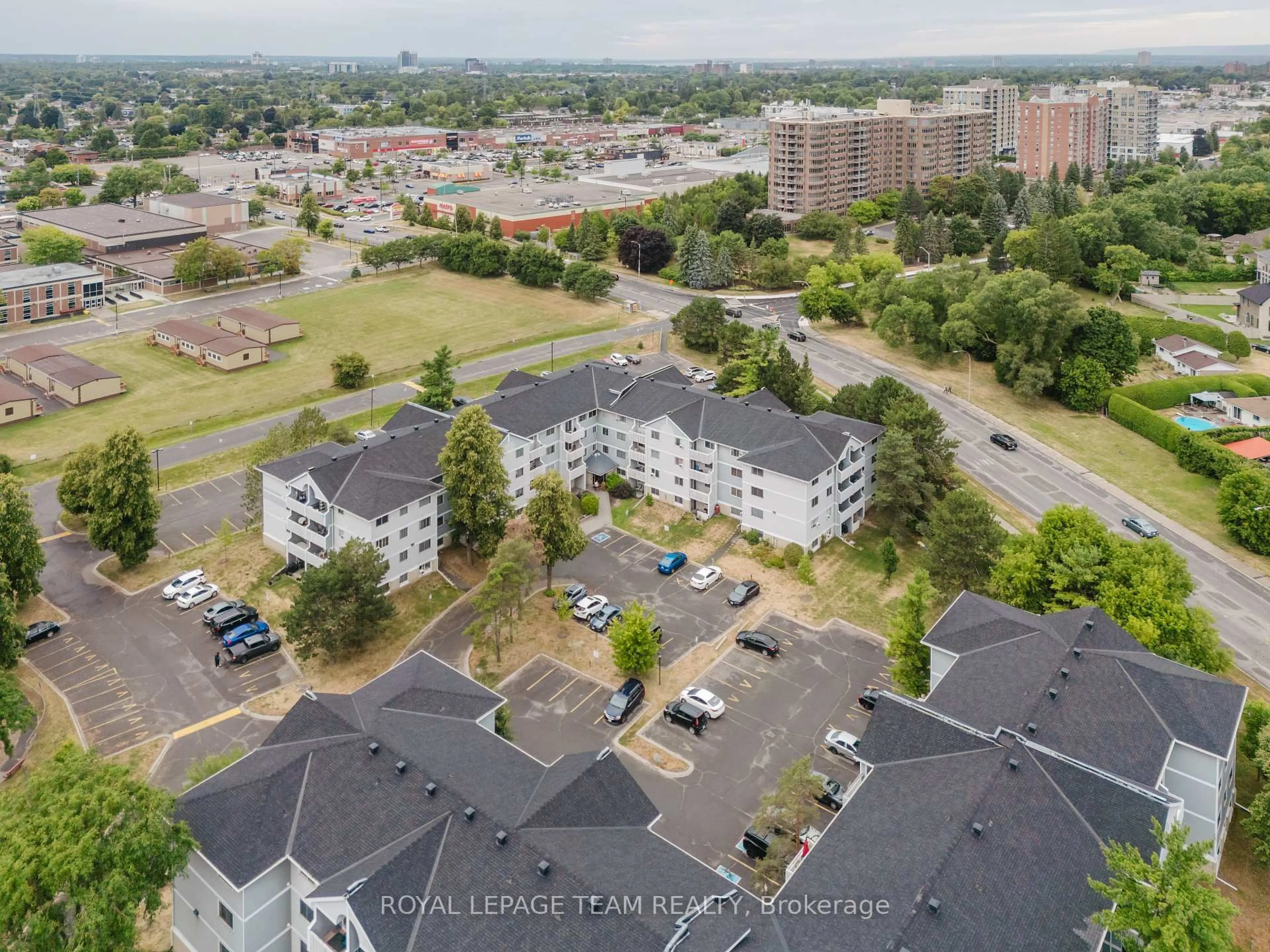 A pic from outside/outdoor area/front of a property/back of a property/a pic from drone, city buildings view from balcony for 212 Viewmount Dr #210, Ottawa Ontario K2E 7X2