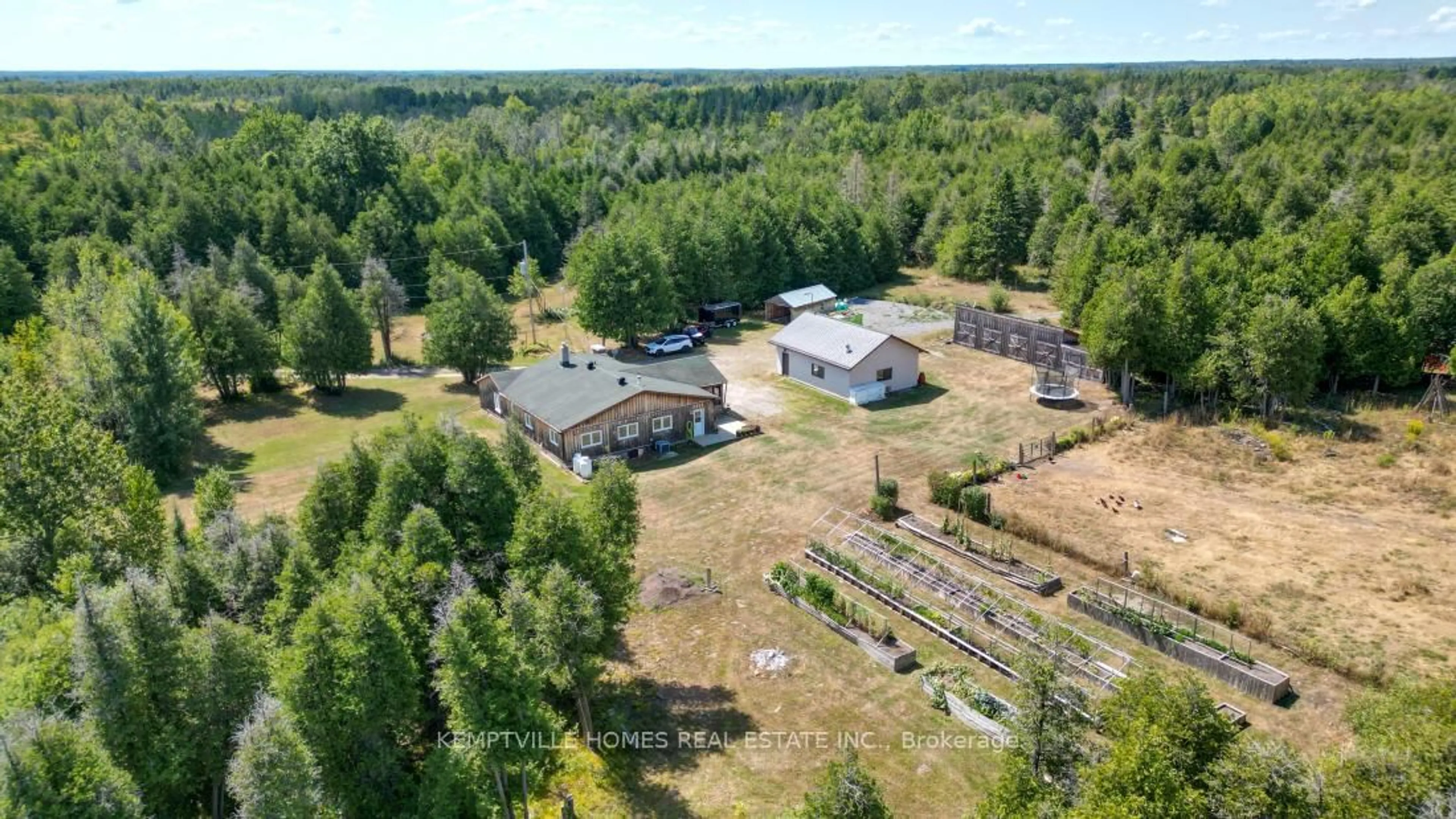 A pic from outside/outdoor area/front of a property/back of a property/a pic from drone, forest/trees view for 4095 Paden Rd, North Gower Ontario K0A 2T0