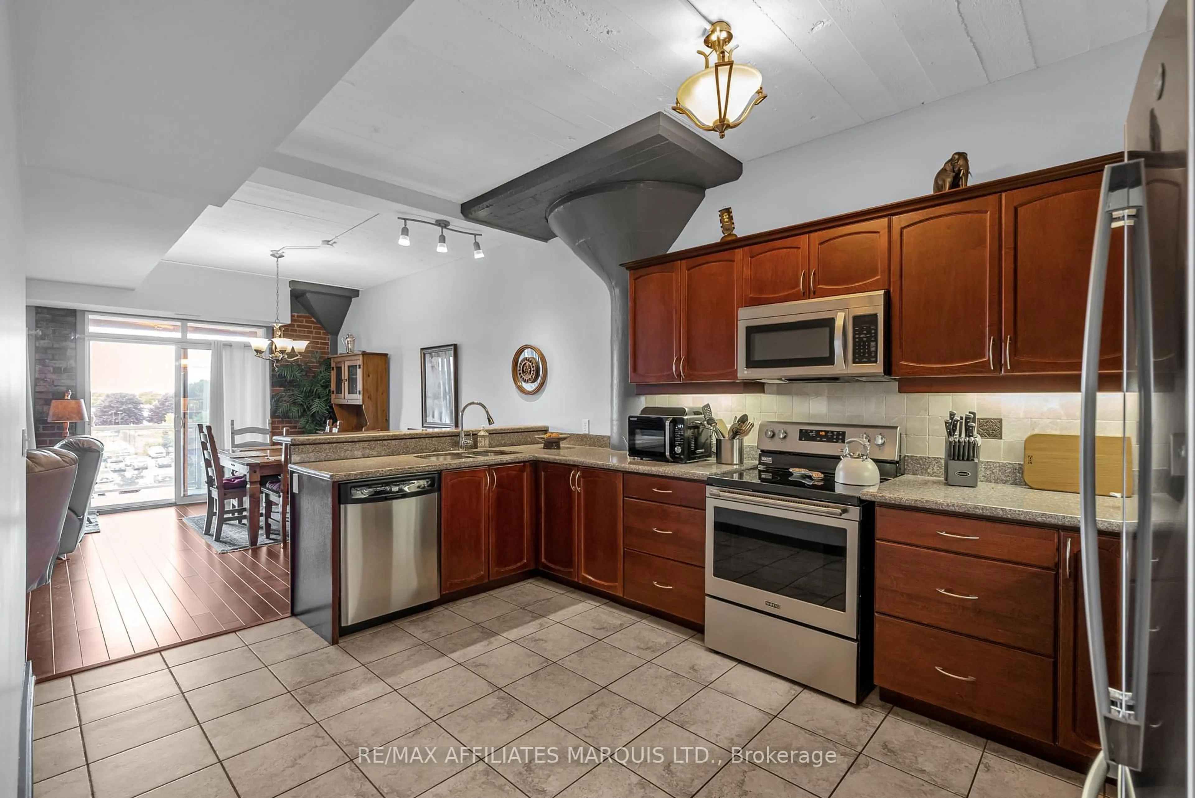 Open concept kitchen, ceramic/tile floor for 710 Cotton Mill St #405, Cornwall Ontario K6H 7L3
