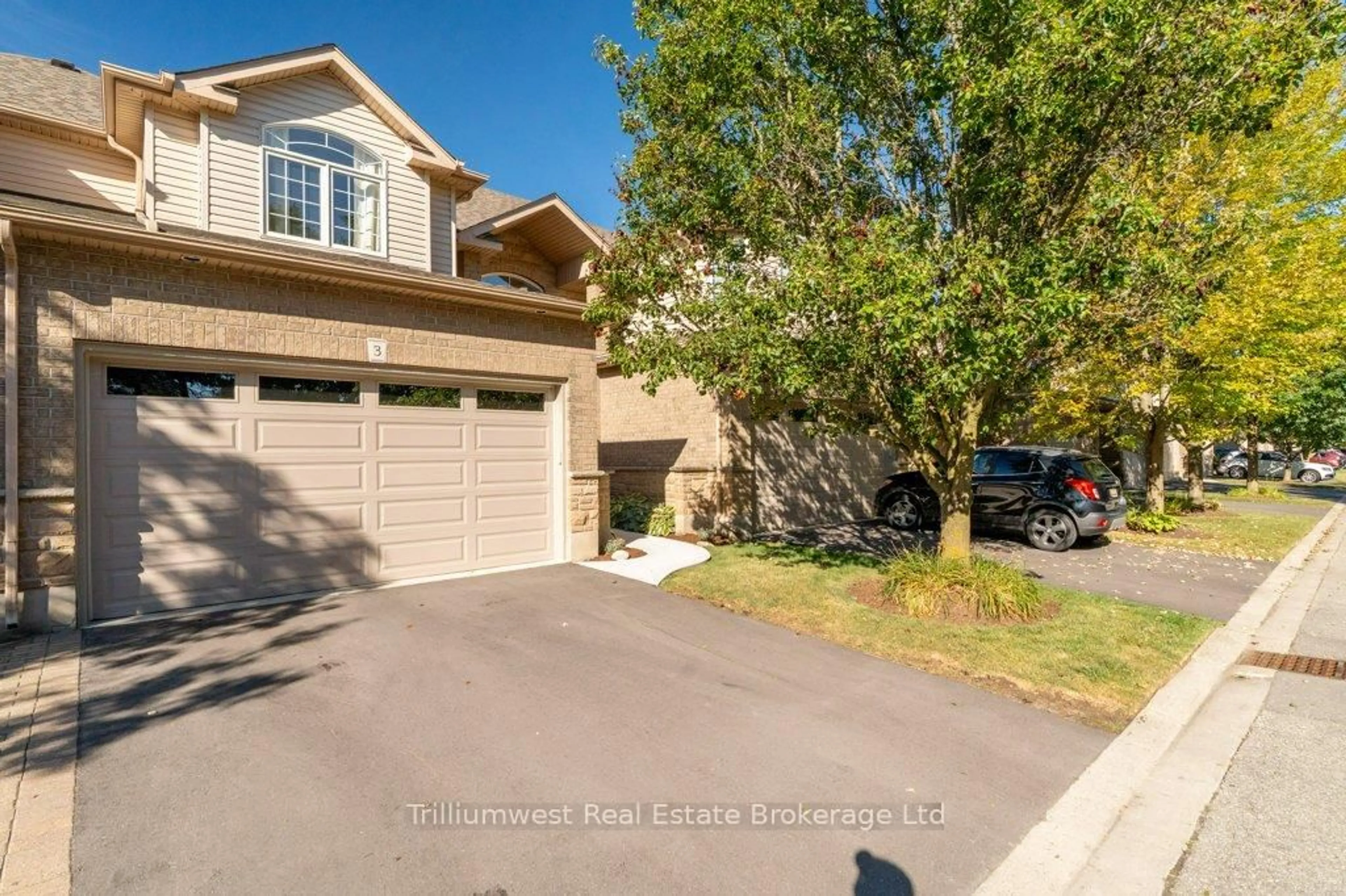 A pic from outside/outdoor area/front of a property/back of a property/a pic from drone, street for 254 Summerfield Dr #3, Guelph Ontario N1L 1R4