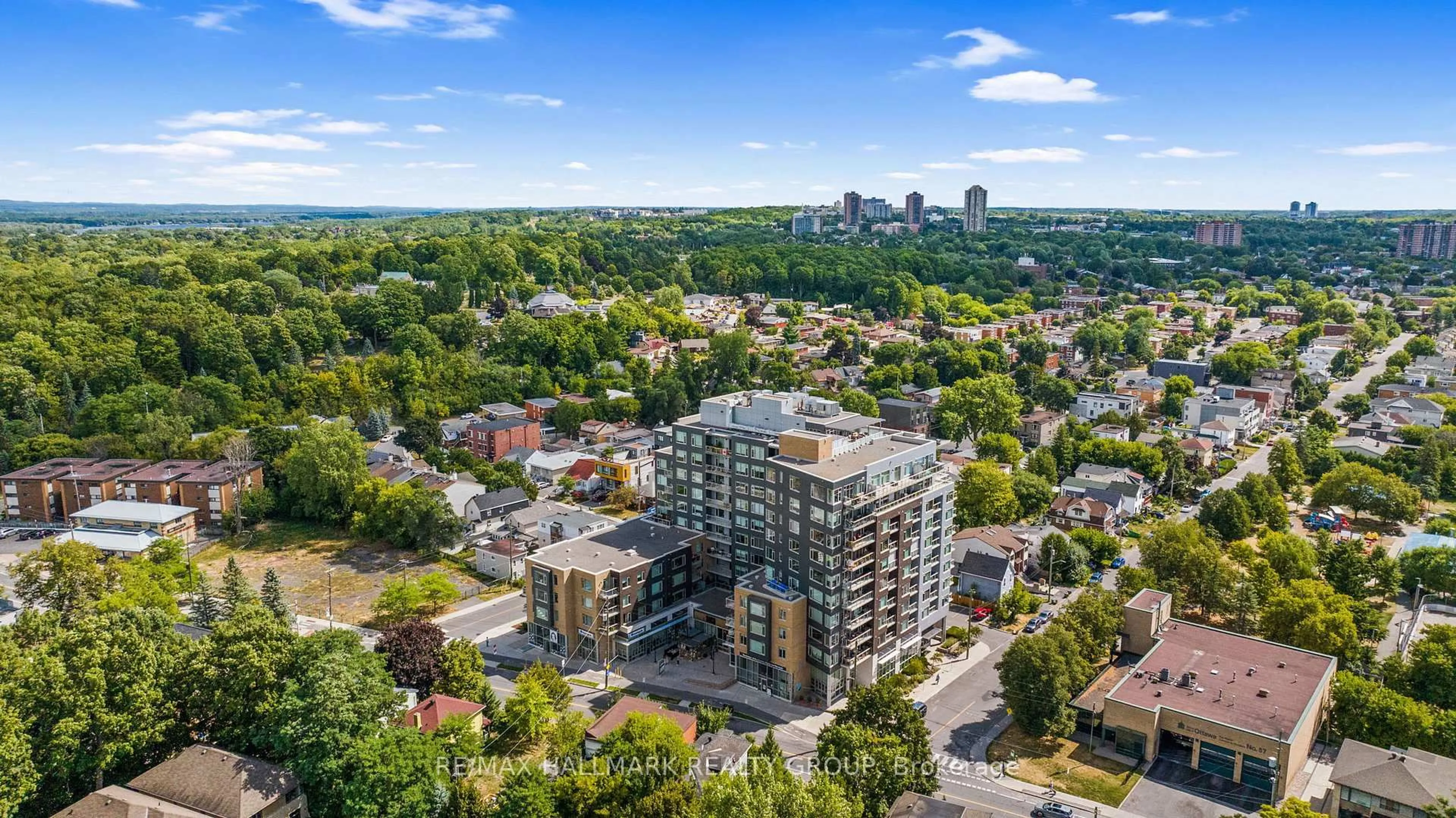 A pic from outside/outdoor area/front of a property/back of a property/a pic from drone, city buildings view from balcony for 7 Marquette Ave #401, Ottawa Ontario K1L 8A7