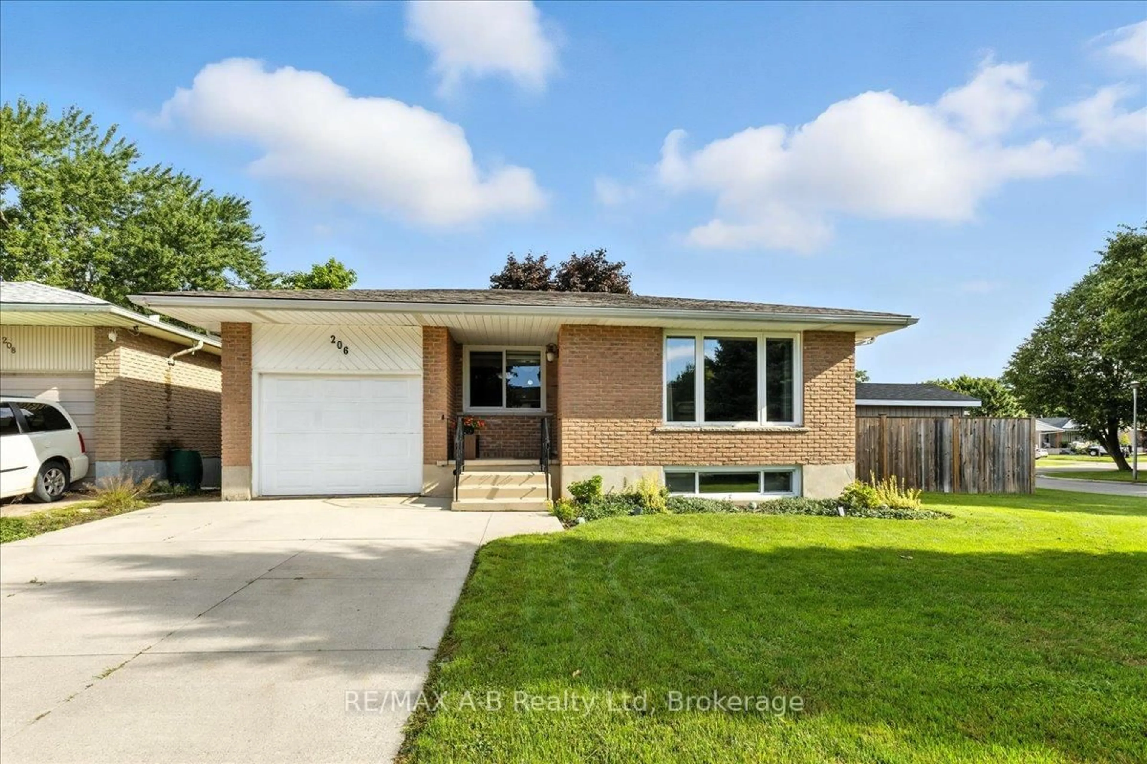 Home with brick exterior material, street for 206 Maple Ave, Stratford Ontario N5A 6Z4