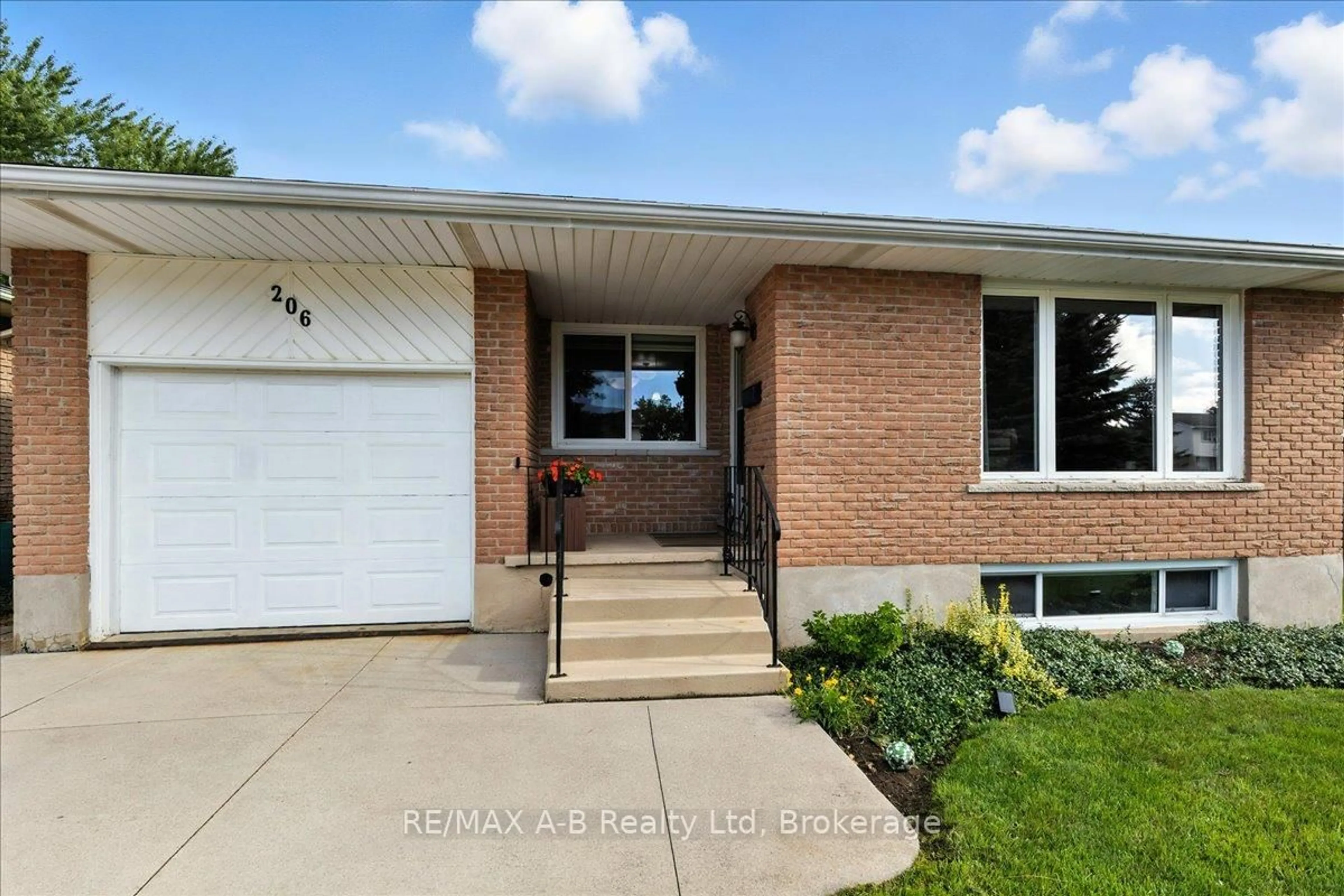 Home with brick exterior material, street for 206 Maple Ave, Stratford Ontario N5A 6Z4