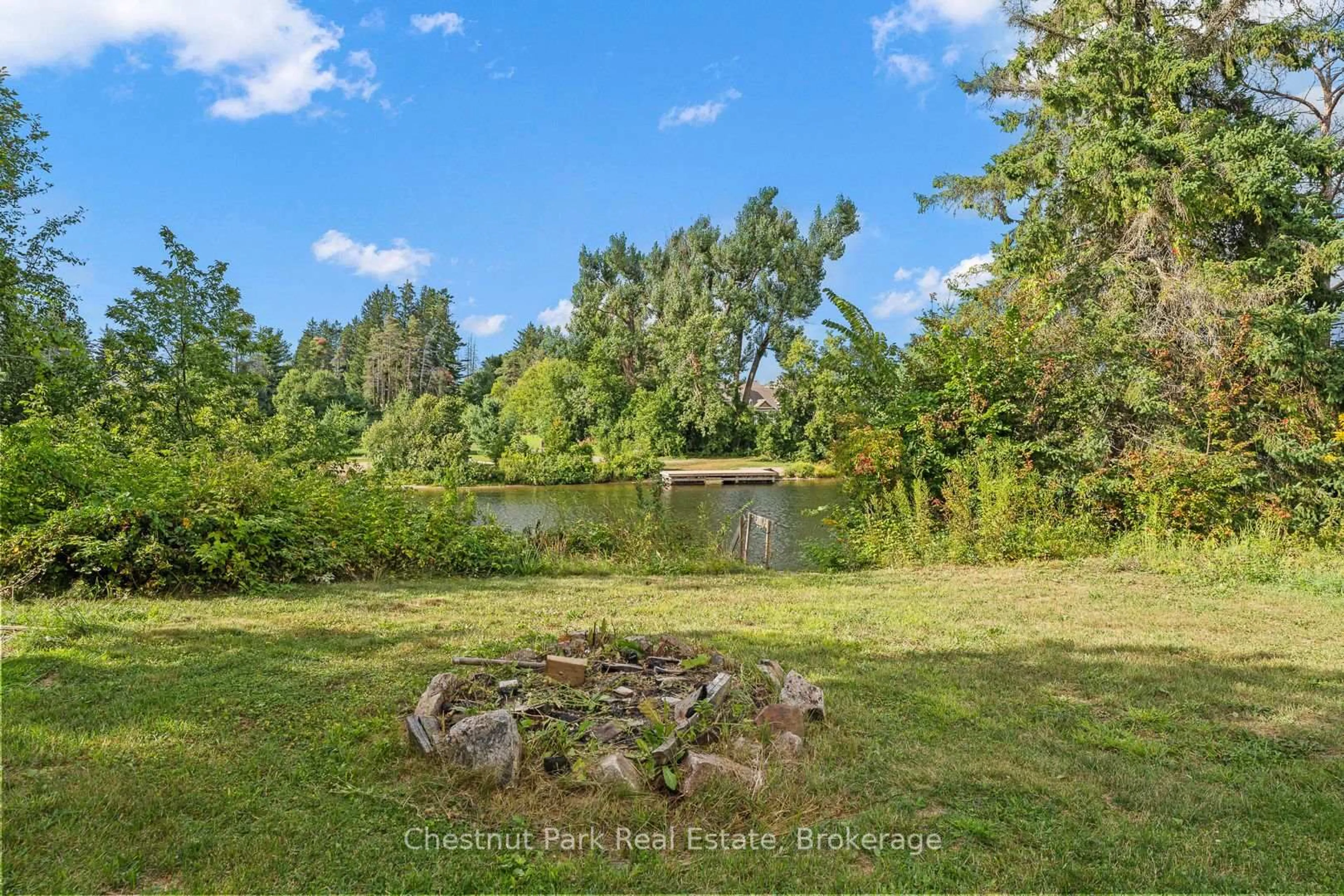 A pic from outside/outdoor area/front of a property/back of a property/a pic from drone, water/lake/river/ocean view for 70 Beaumont Dr, Bracebridge Ontario P1L 1X2