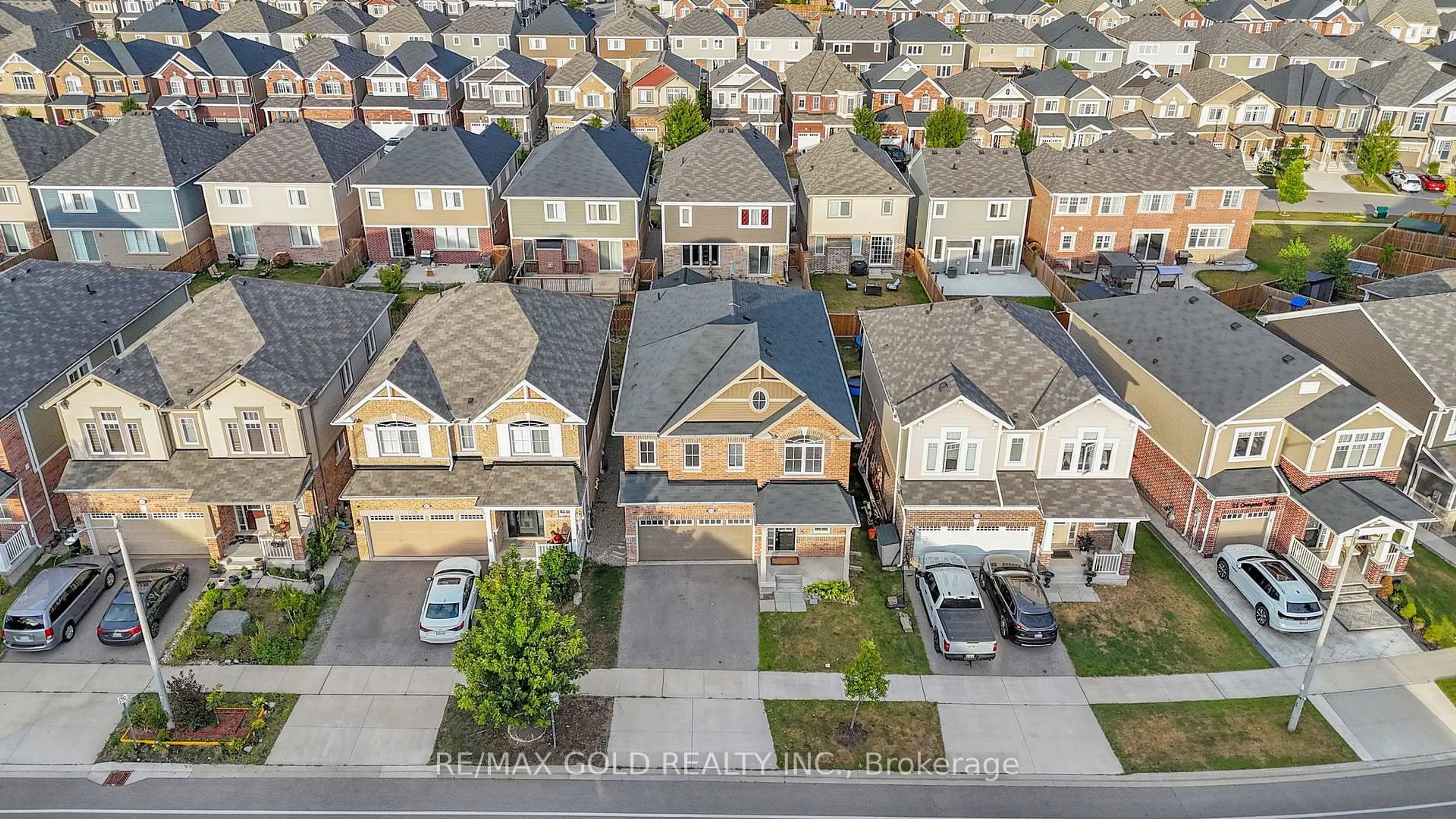 A pic from outside/outdoor area/front of a property/back of a property/a pic from drone, street for 63 Compass Tr, Cambridge Ontario N3E 0B3