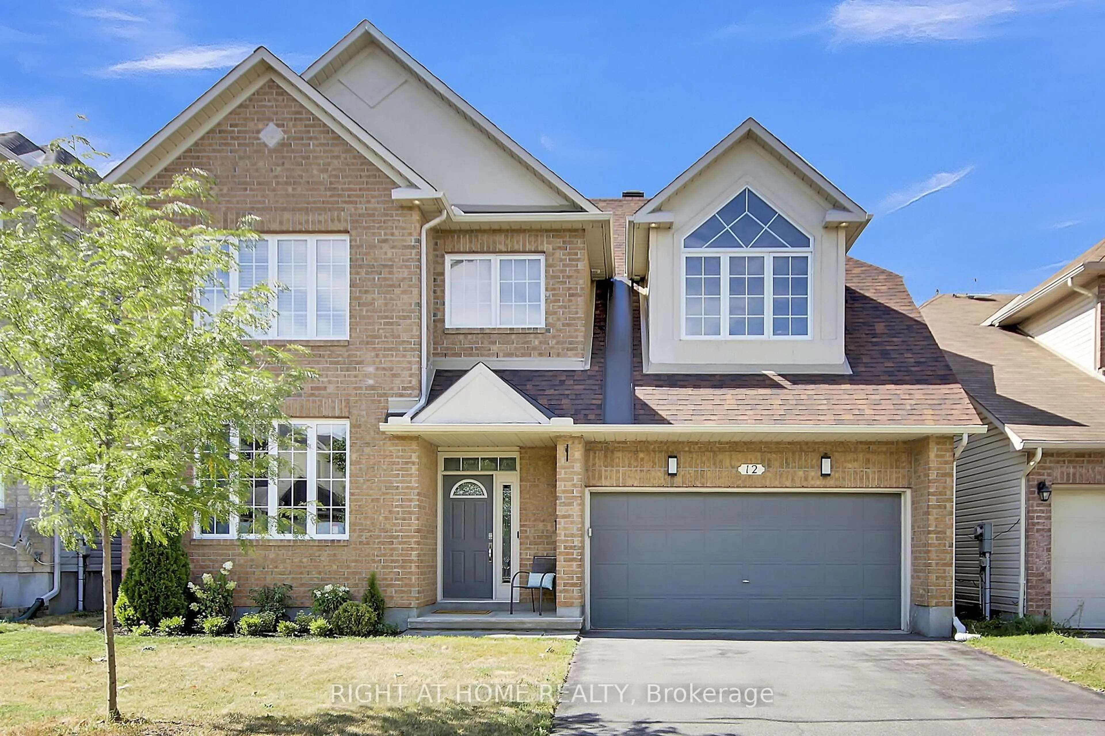 Home with brick exterior material, street for 12 Ealing St, Ottawa Ontario K2W 1E4