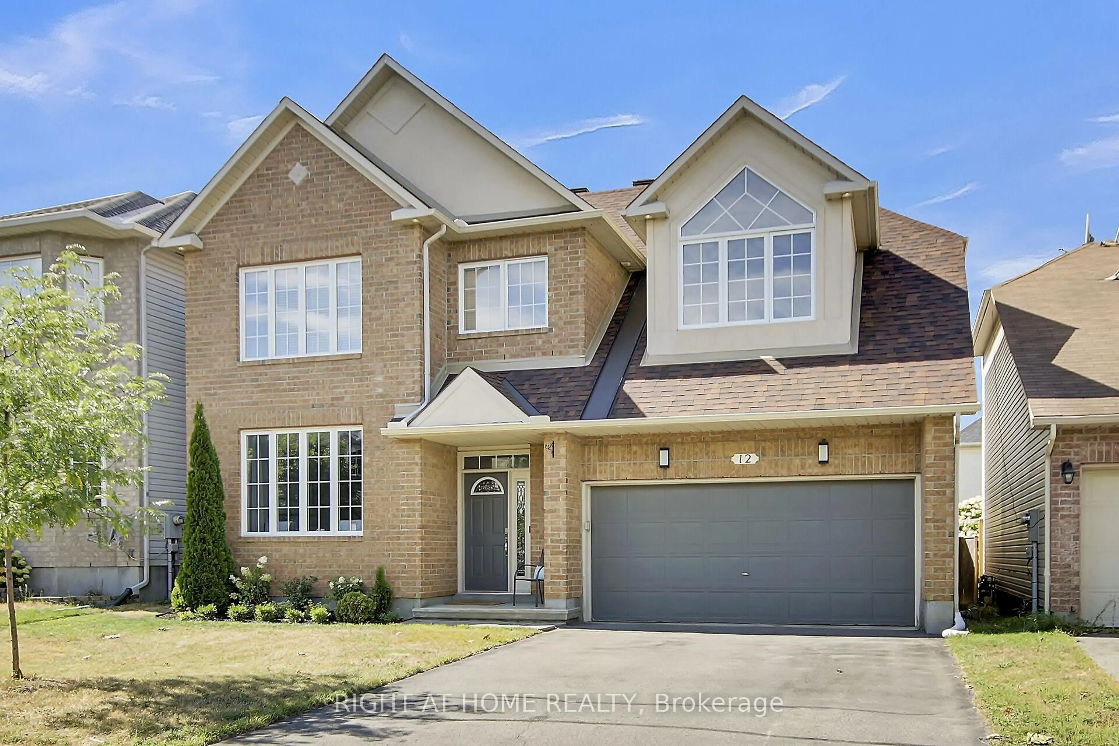 Home with brick exterior material, street for 12 Ealing St, Ottawa Ontario K2W 1E4
