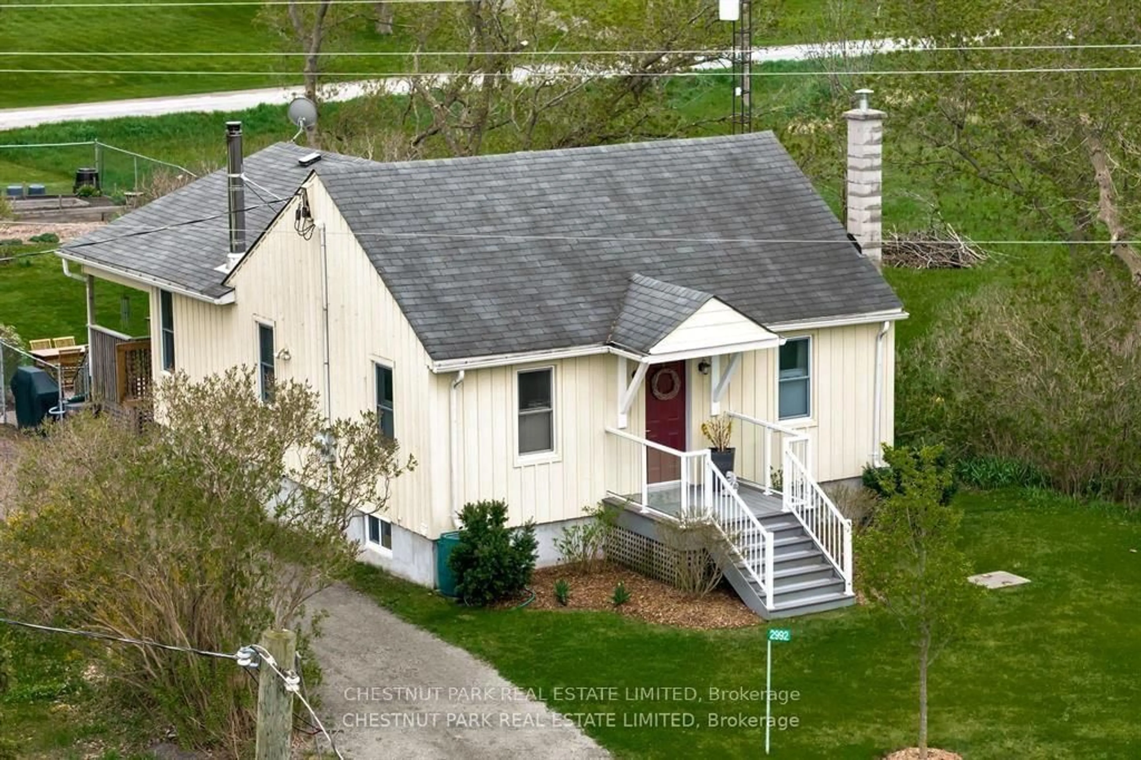 A pic from outside/outdoor area/front of a property/back of a property/a pic from drone, street for 2992 County Road 10, Prince Edward County Ontario K0K 2P0