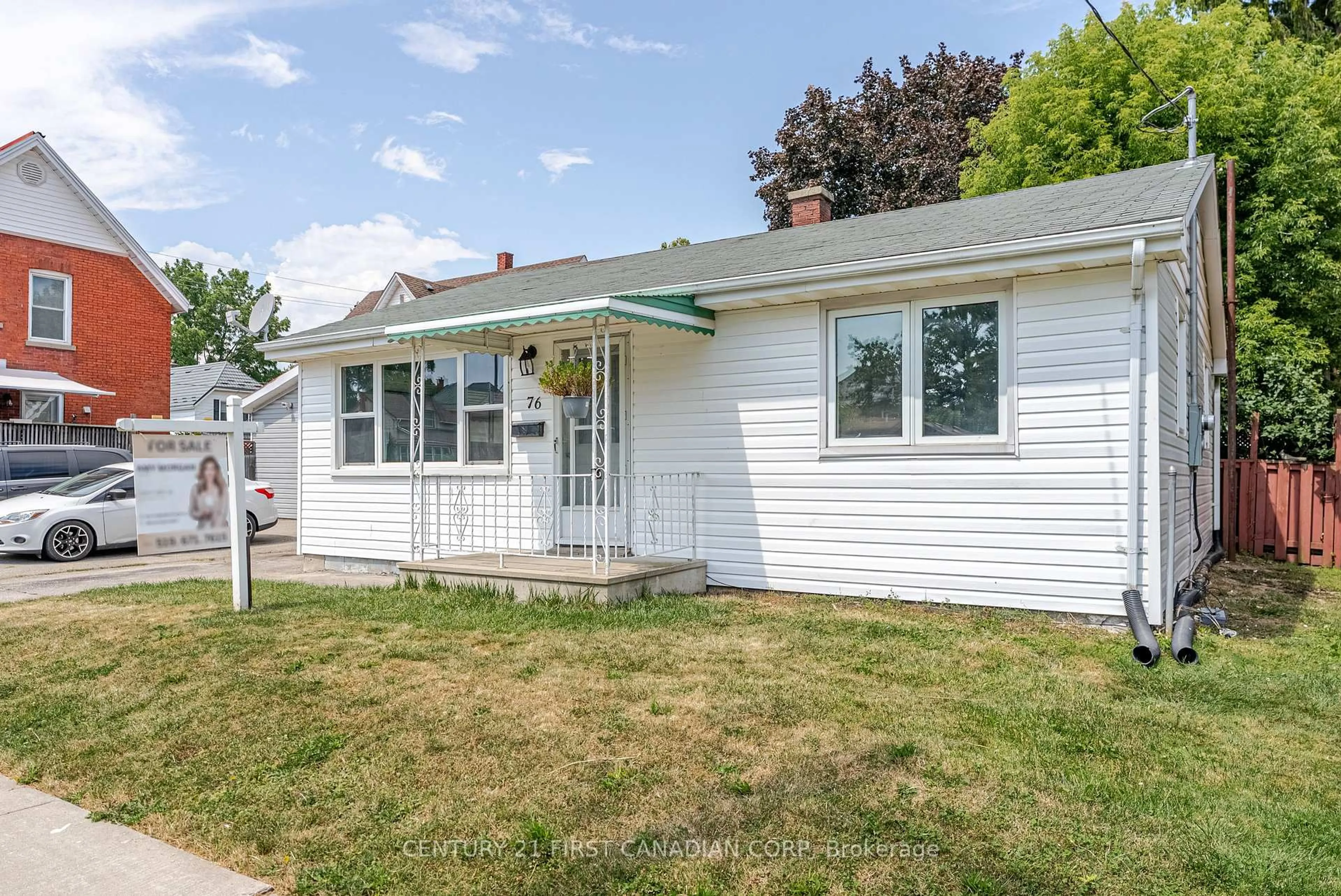 Home with vinyl exterior material, street for 76 Myrtle St, St. Thomas Ontario N5R 2G1