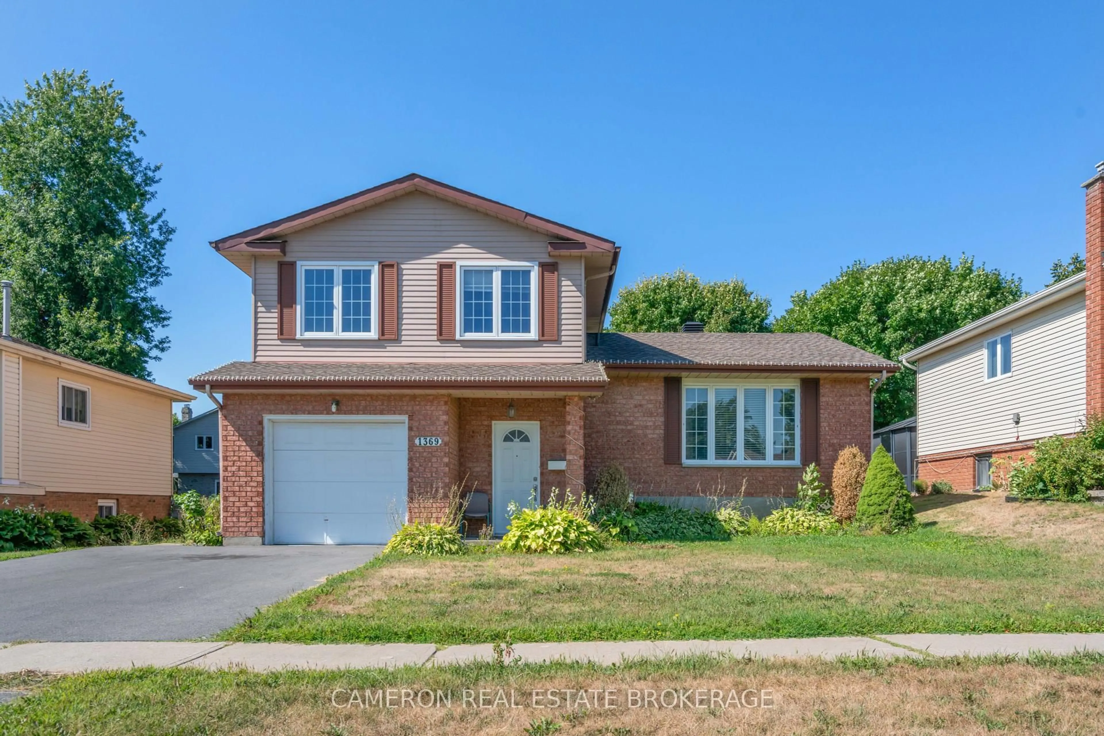 Home with brick exterior material, street for 1369 Lochiel St, Cornwall Ontario K6H 6N5