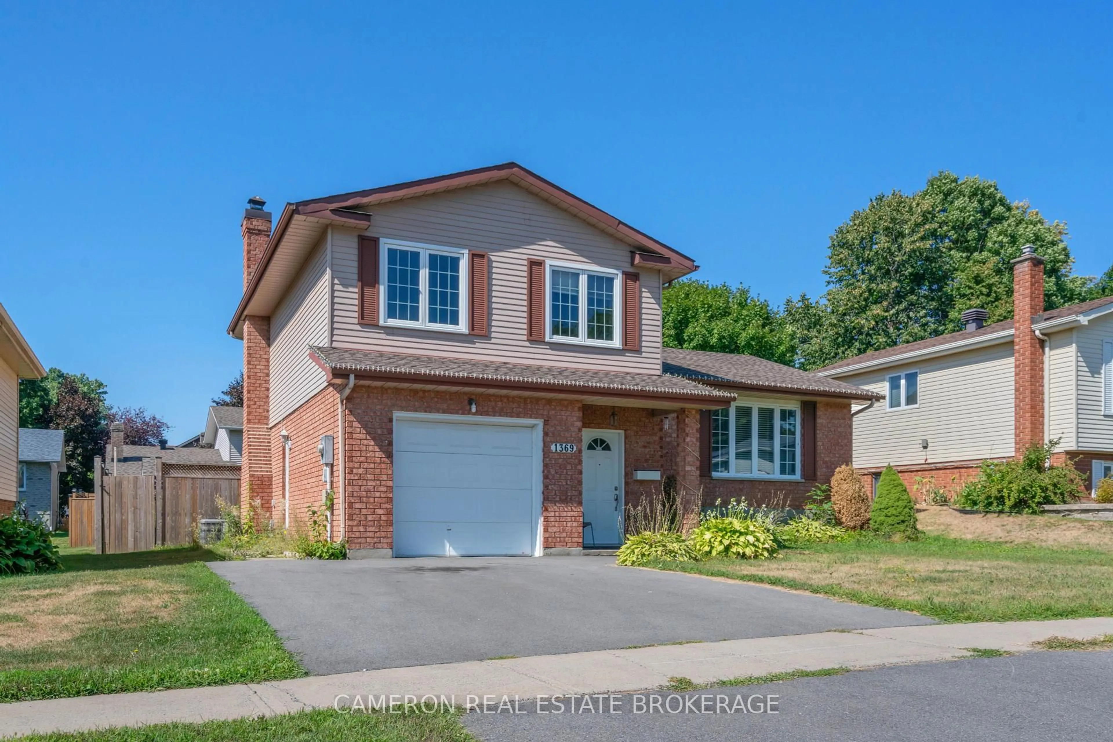 Home with brick exterior material, street for 1369 Lochiel St, Cornwall Ontario K6H 6N5