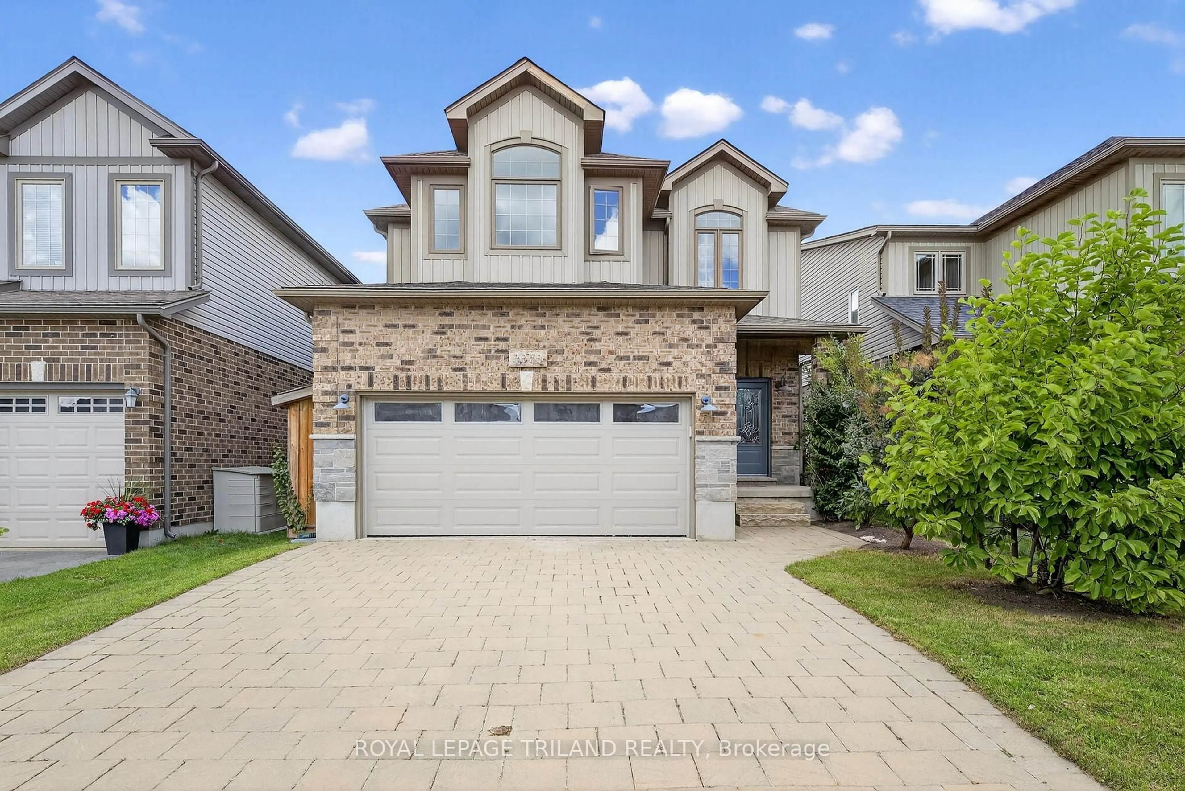 Home with brick exterior material, street for 3373 Paulpeel Ave, London South Ontario N6L 0A4