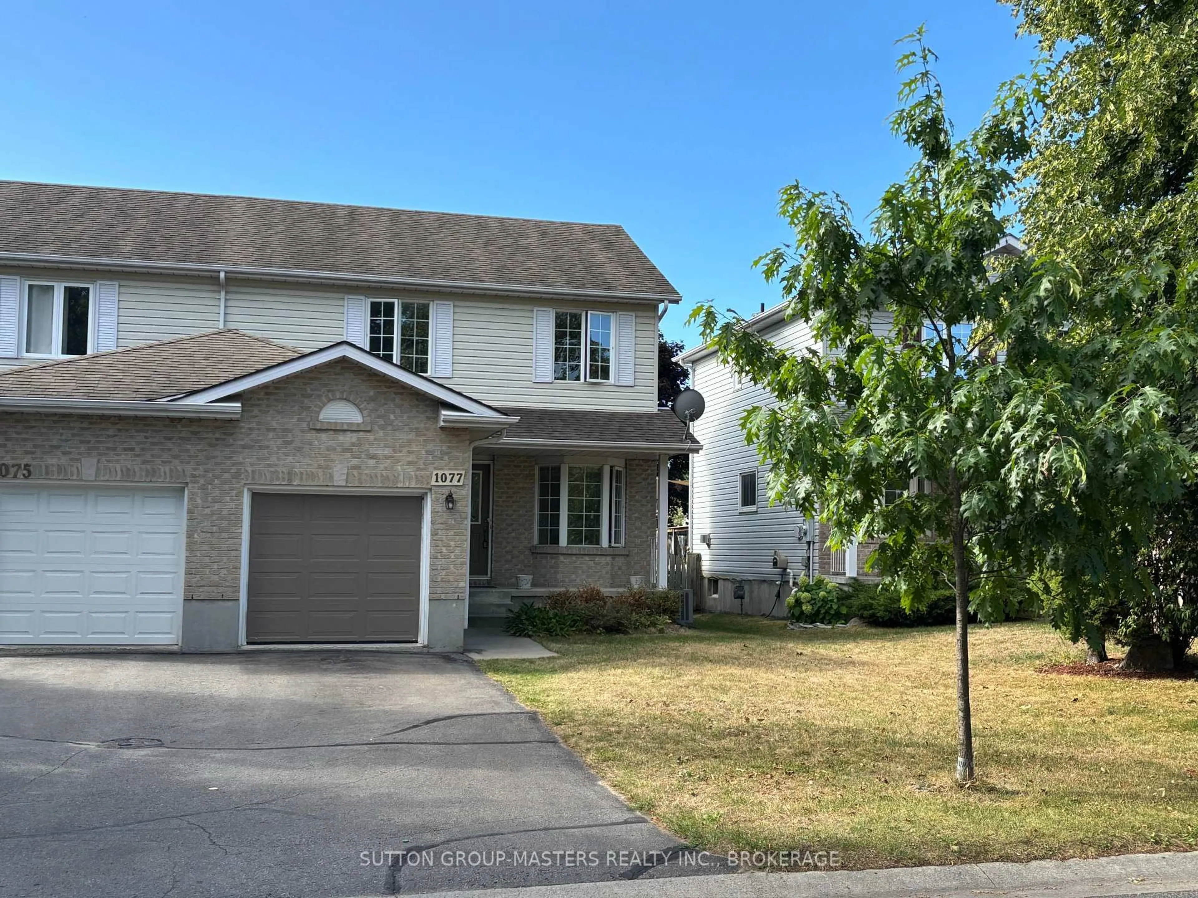 A pic from outside/outdoor area/front of a property/back of a property/a pic from drone, street for 1077 Acadia Dr, Kingston Ontario K7M 8V7