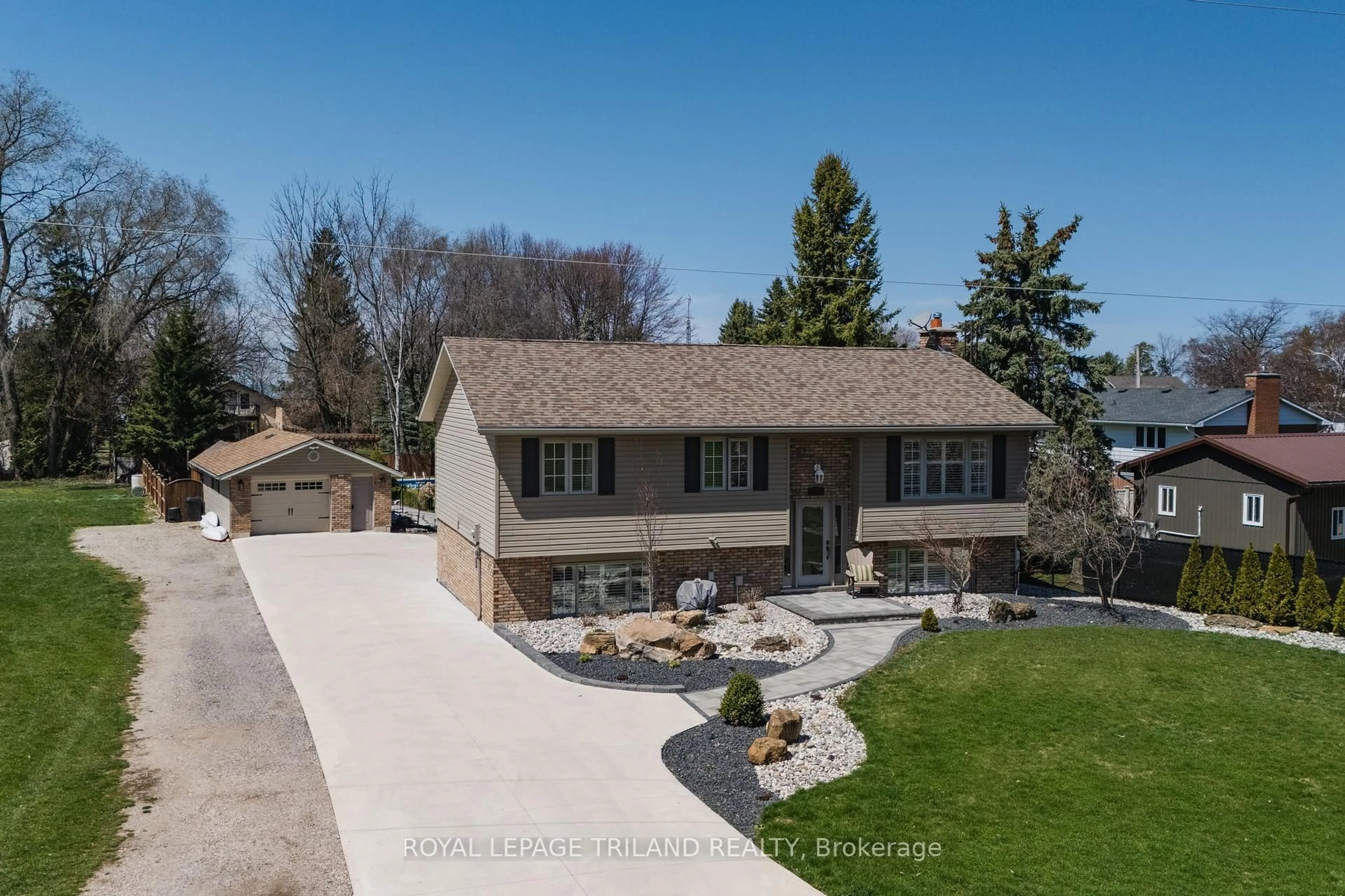 A pic from outside/outdoor area/front of a property/back of a property/a pic from drone, street for 5410 Lake Valley Grove Rd, Lambton Shores Ontario N0N 1J7