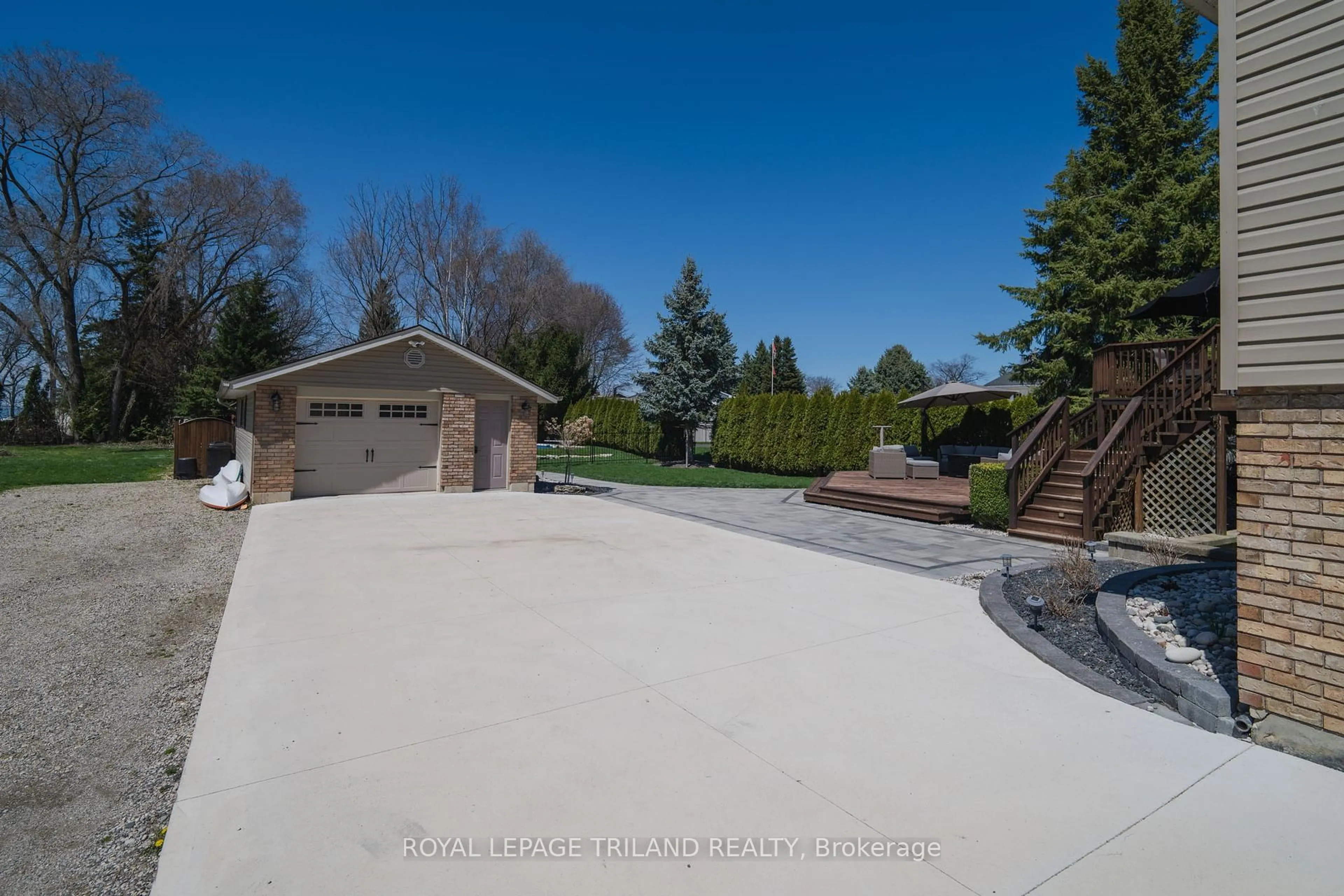 A pic from outside/outdoor area/front of a property/back of a property/a pic from drone, street for 5410 Lake Valley Grove Rd, Lambton Shores Ontario N0N 1J7