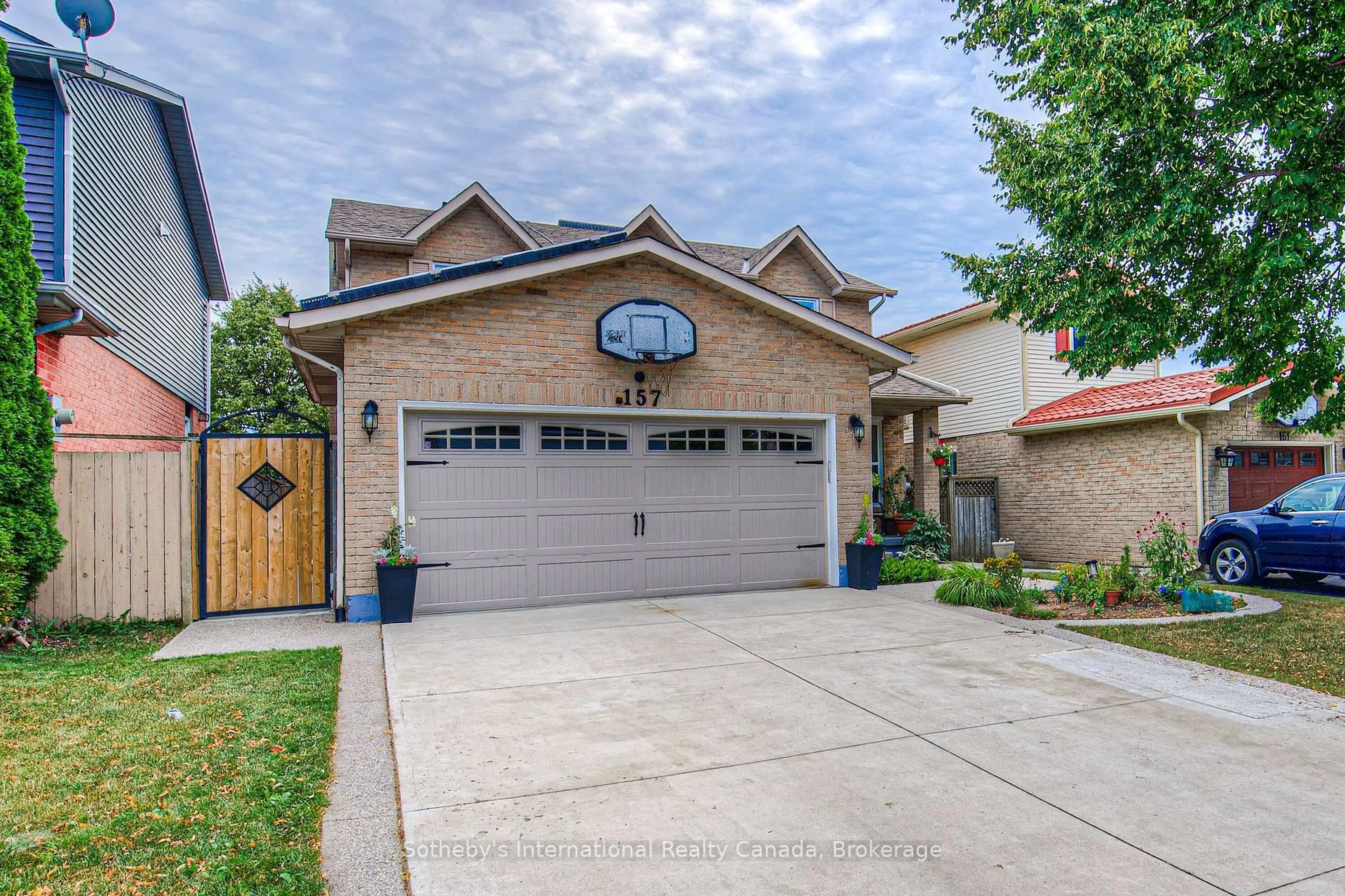 Home with brick exterior material, street for 157 Twin Cres, Hamilton Ontario L8W 3A7