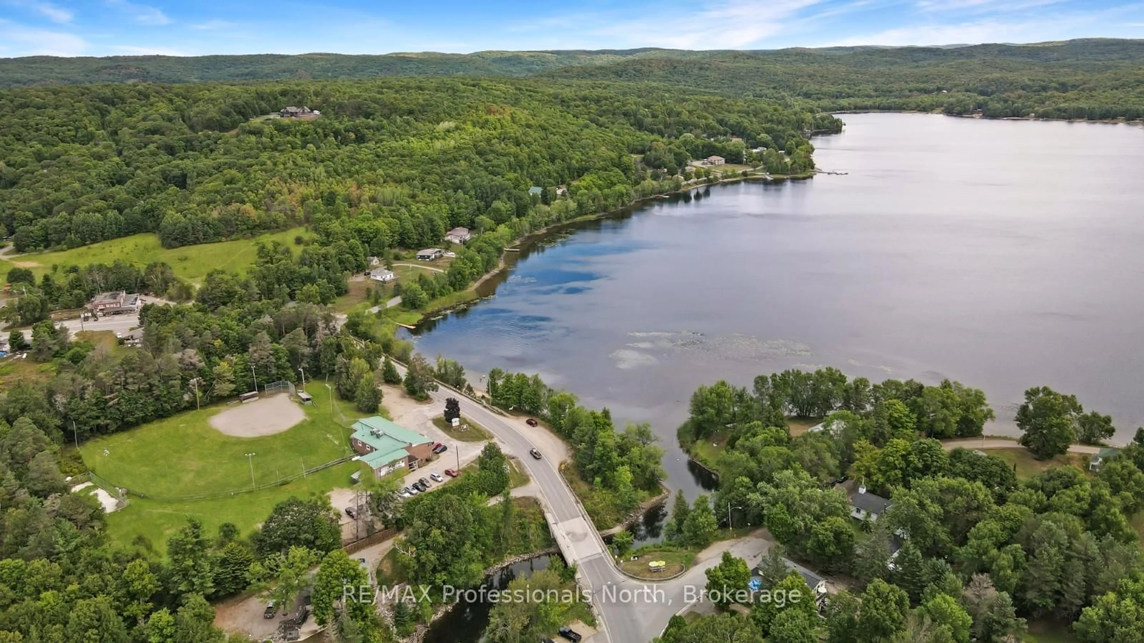 A pic from outside/outdoor area/front of a property/back of a property/a pic from drone, water/lake/river/ocean view for 1018 St. Andrews Crt, Dysart et al Ontario K0M 1S0