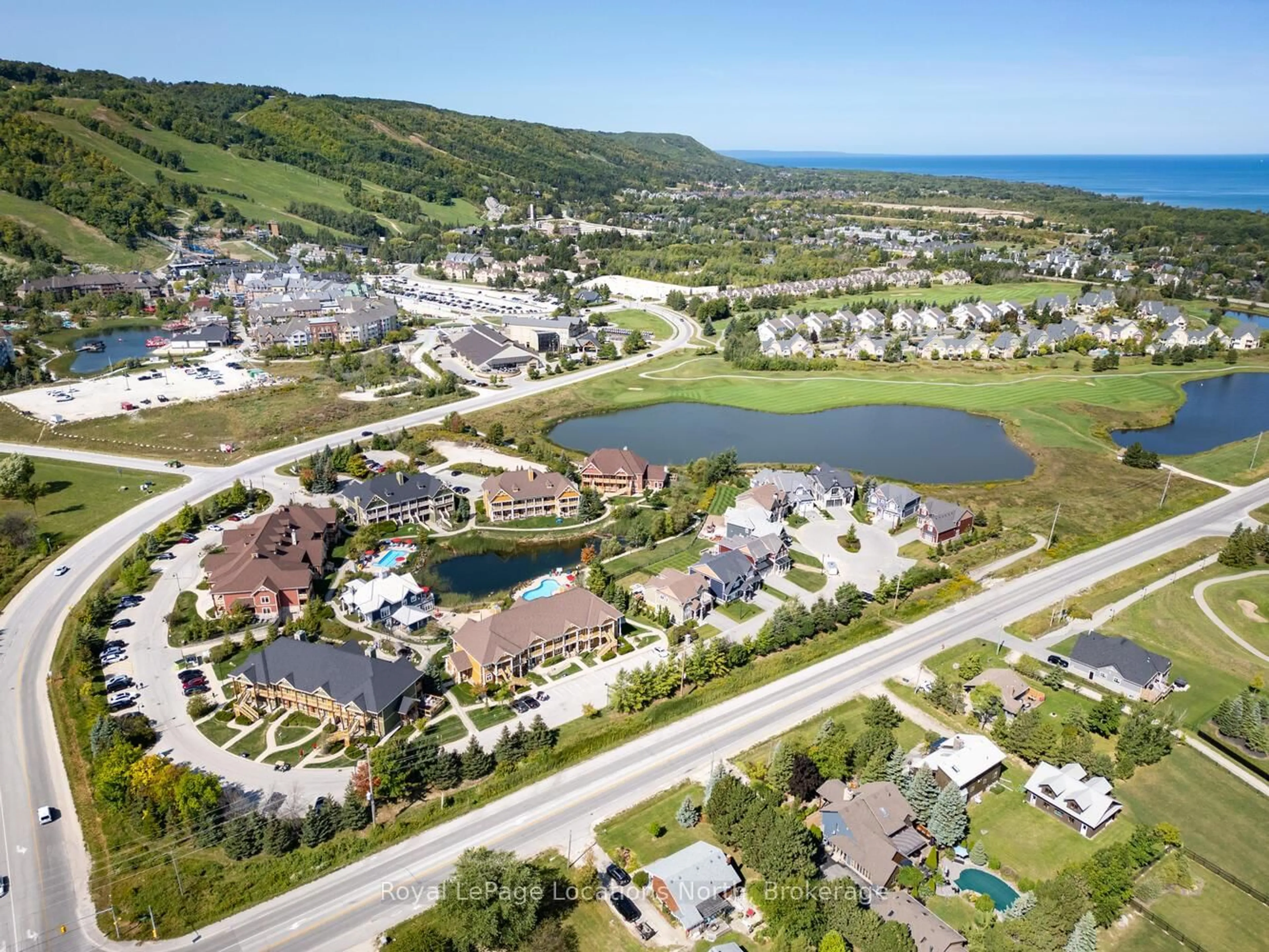 A pic from outside/outdoor area/front of a property/back of a property/a pic from drone, water/lake/river/ocean view for 277 JOZO WEIDER Blvd #902, Blue Mountains Ontario L9Y 1V0