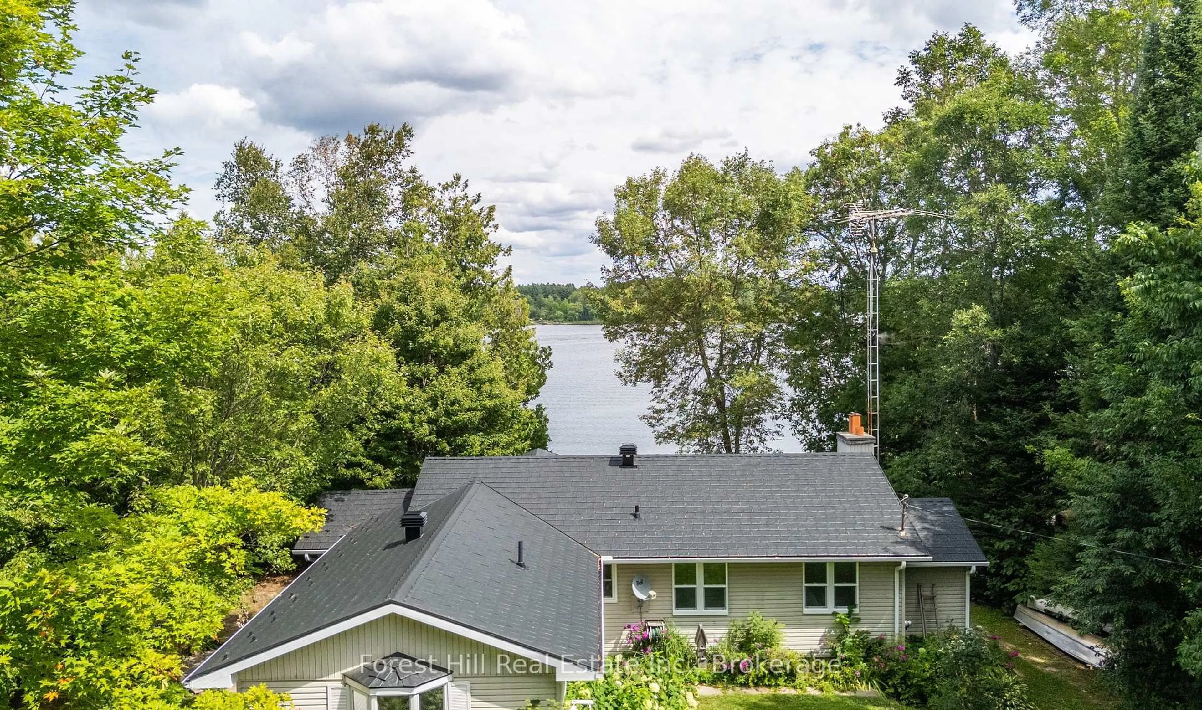 A pic from outside/outdoor area/front of a property/back of a property/a pic from drone, water/lake/river/ocean view for 6 Trillium Lane, Whitestone Ontario P0A 1G0