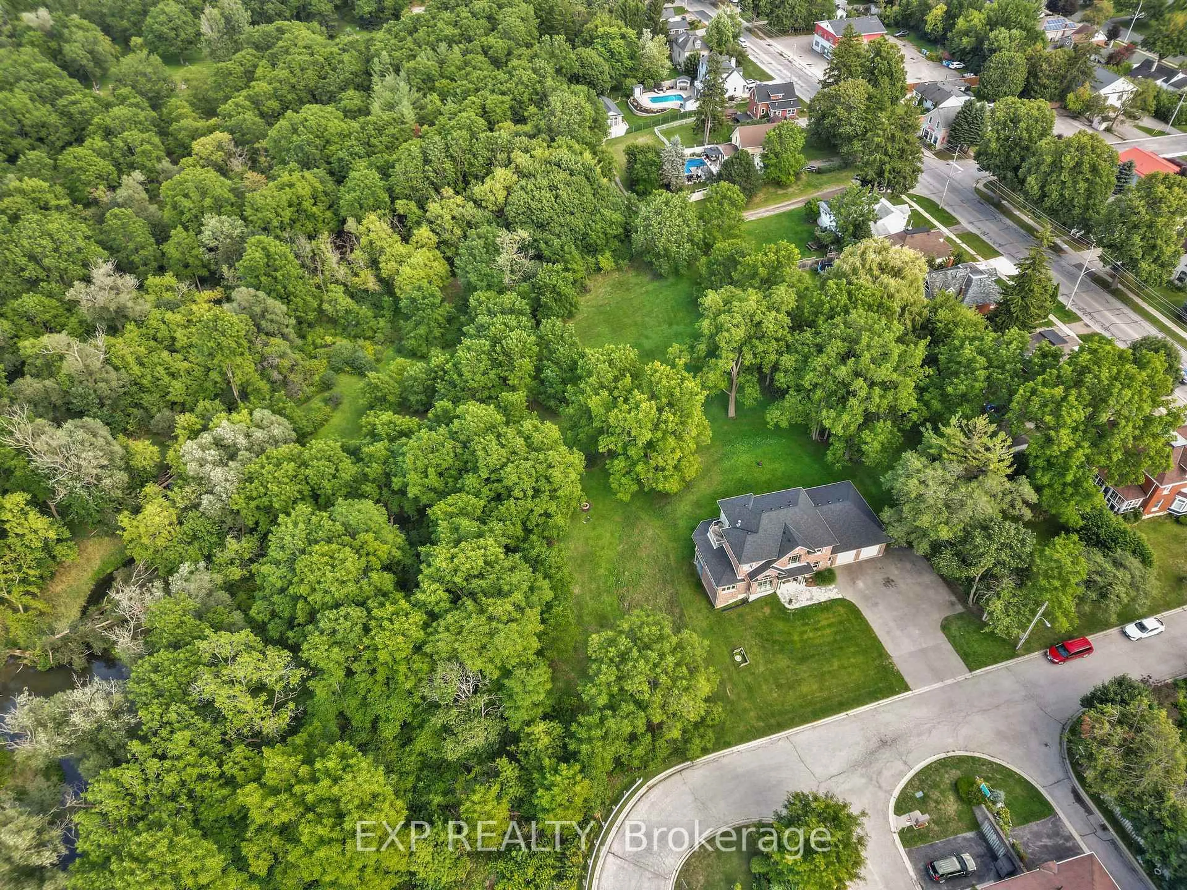 A pic from outside/outdoor area/front of a property/back of a property/a pic from drone, forest/trees view for 17 HURON St, St. Marys Ontario N4X 1C2
