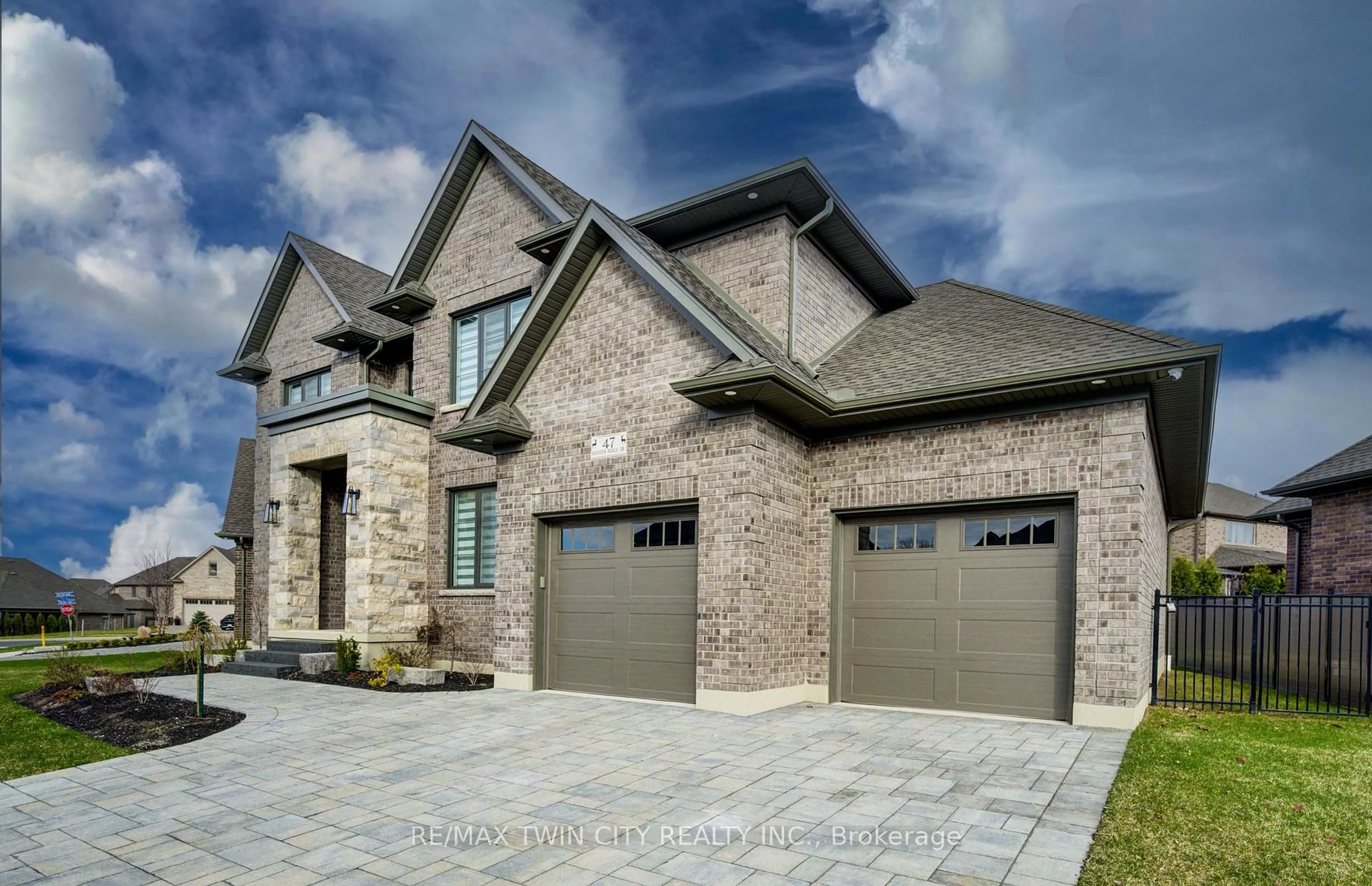 Home with brick exterior material, street for 47 Pioneer Ridge Dr, Kitchener Ontario N2P 0G6