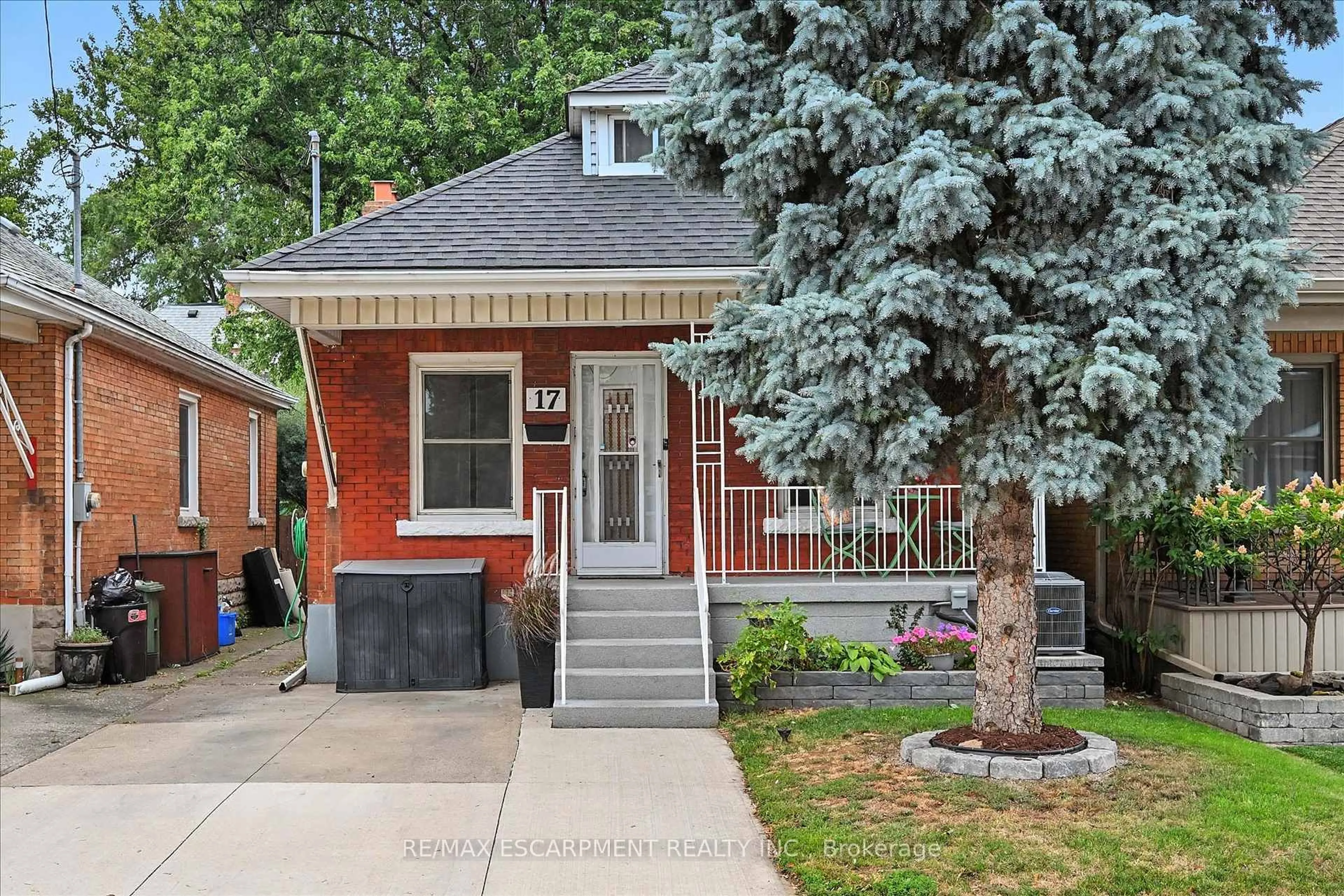 Home with brick exterior material, street for 17 Cameron Ave, Hamilton Ontario L8H 4Y9