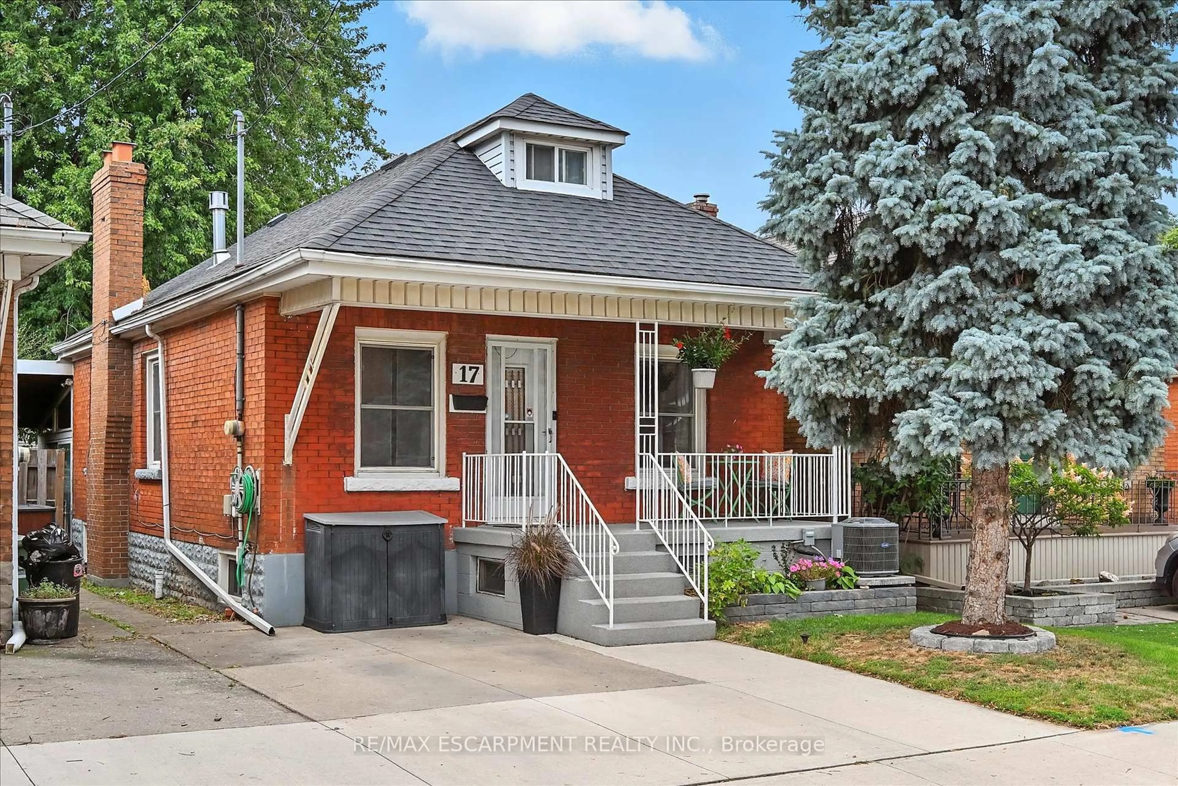 Home with brick exterior material, street for 17 Cameron Ave, Hamilton Ontario L8H 4Y9