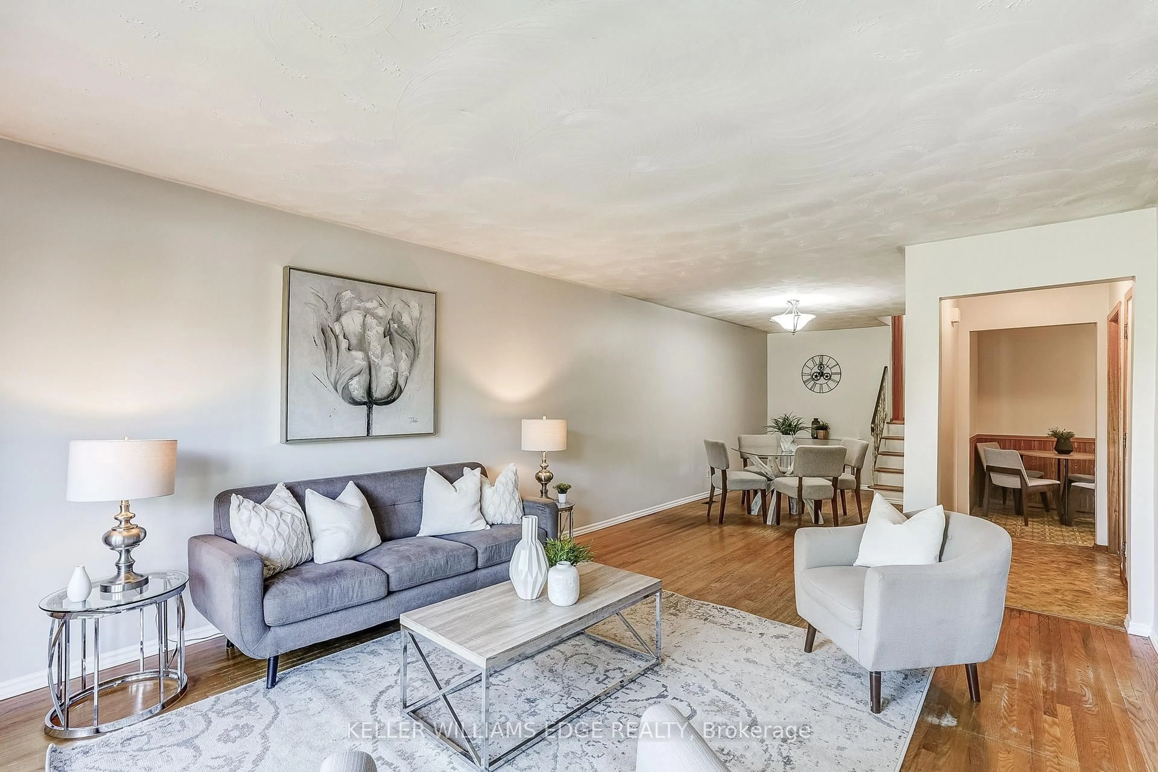 Living room with furniture, unknown for 63 1/2 Eastbury Dr, Hamilton Ontario L8E 2V8