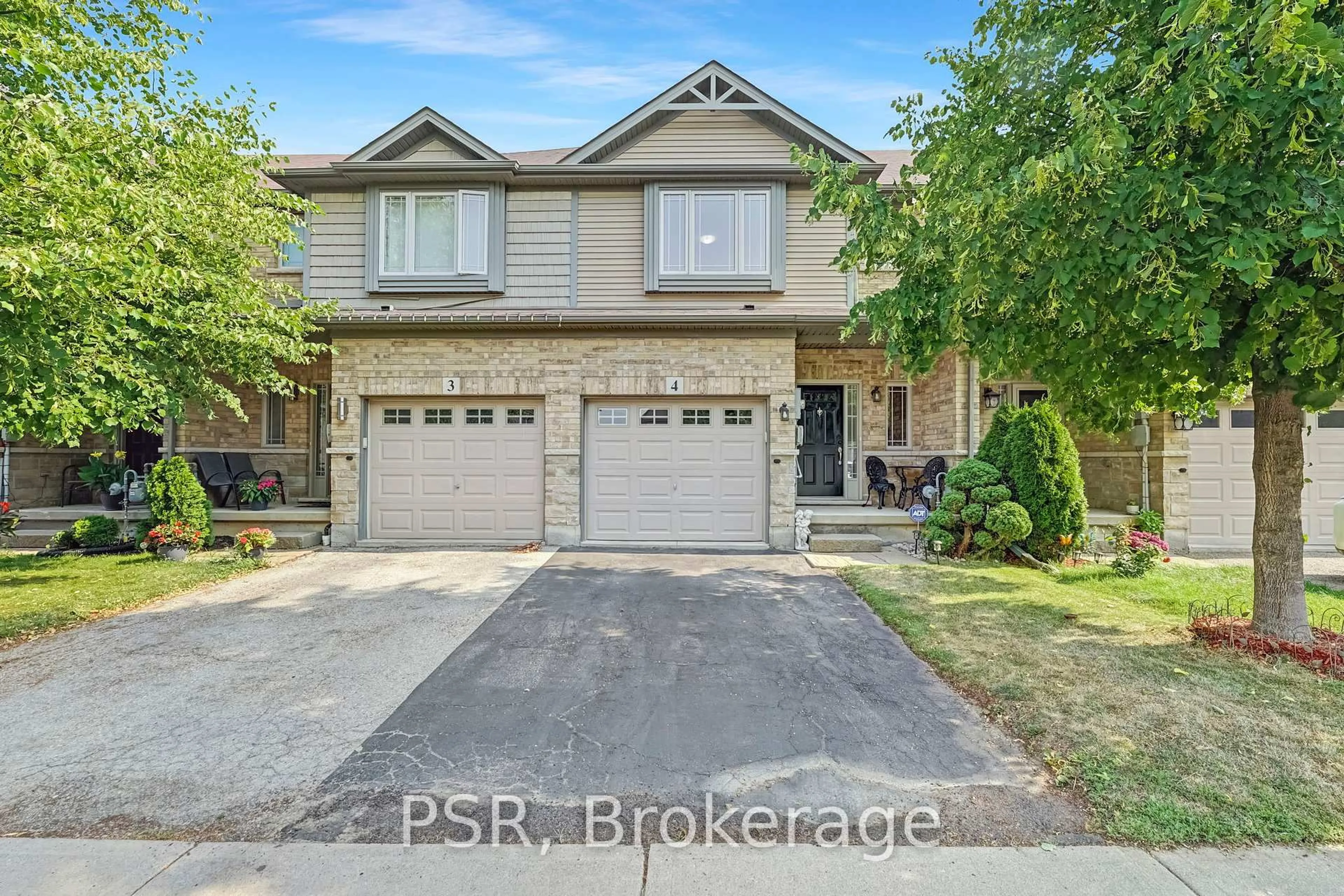 Home with brick exterior material, street for 310 Fall Fair Way #4, Hamilton Ontario L0R 1C0