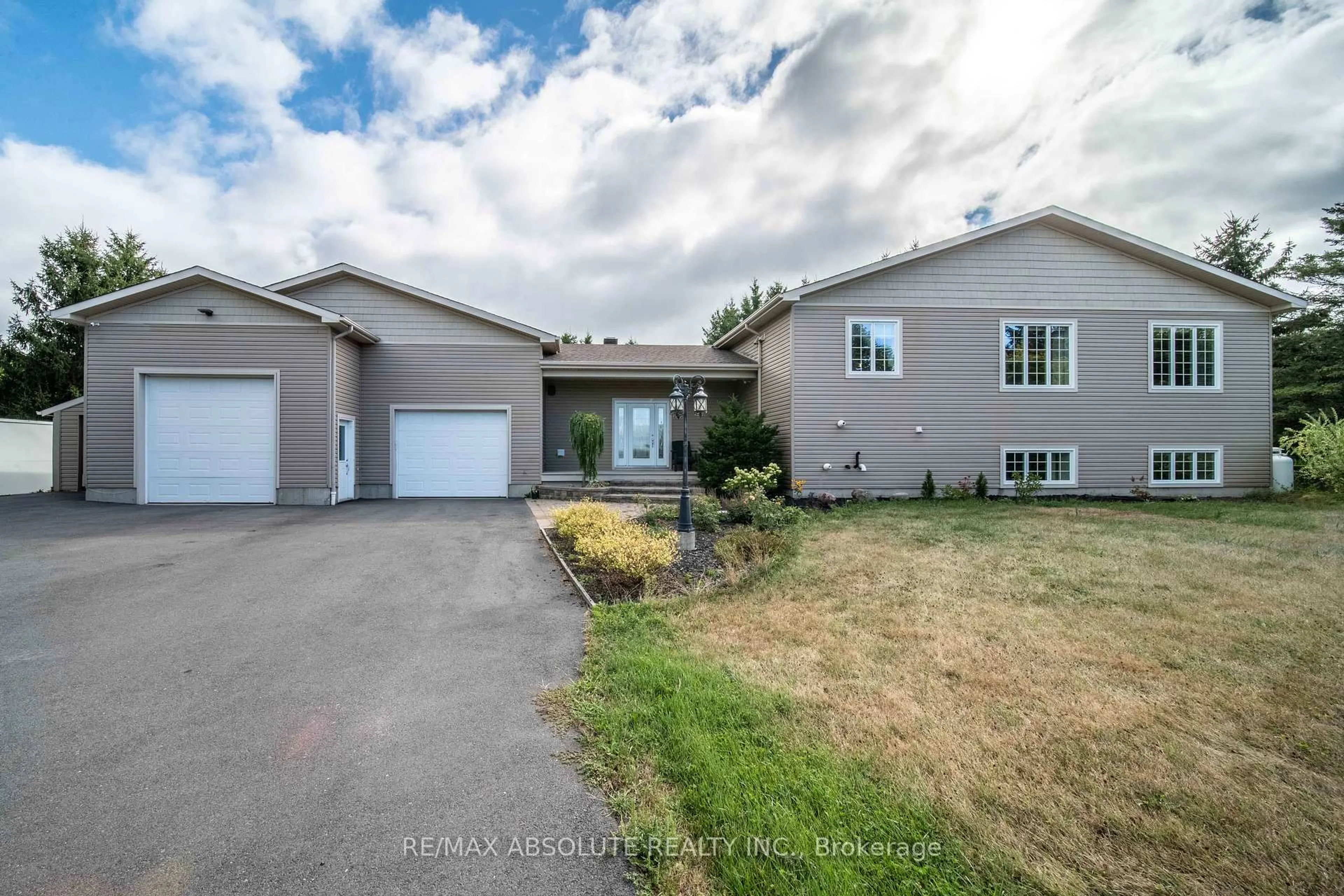 A pic from outside/outdoor area/front of a property/back of a property/a pic from drone, street for 735 St Thomas Rd, Russell Ontario K0A 1W0