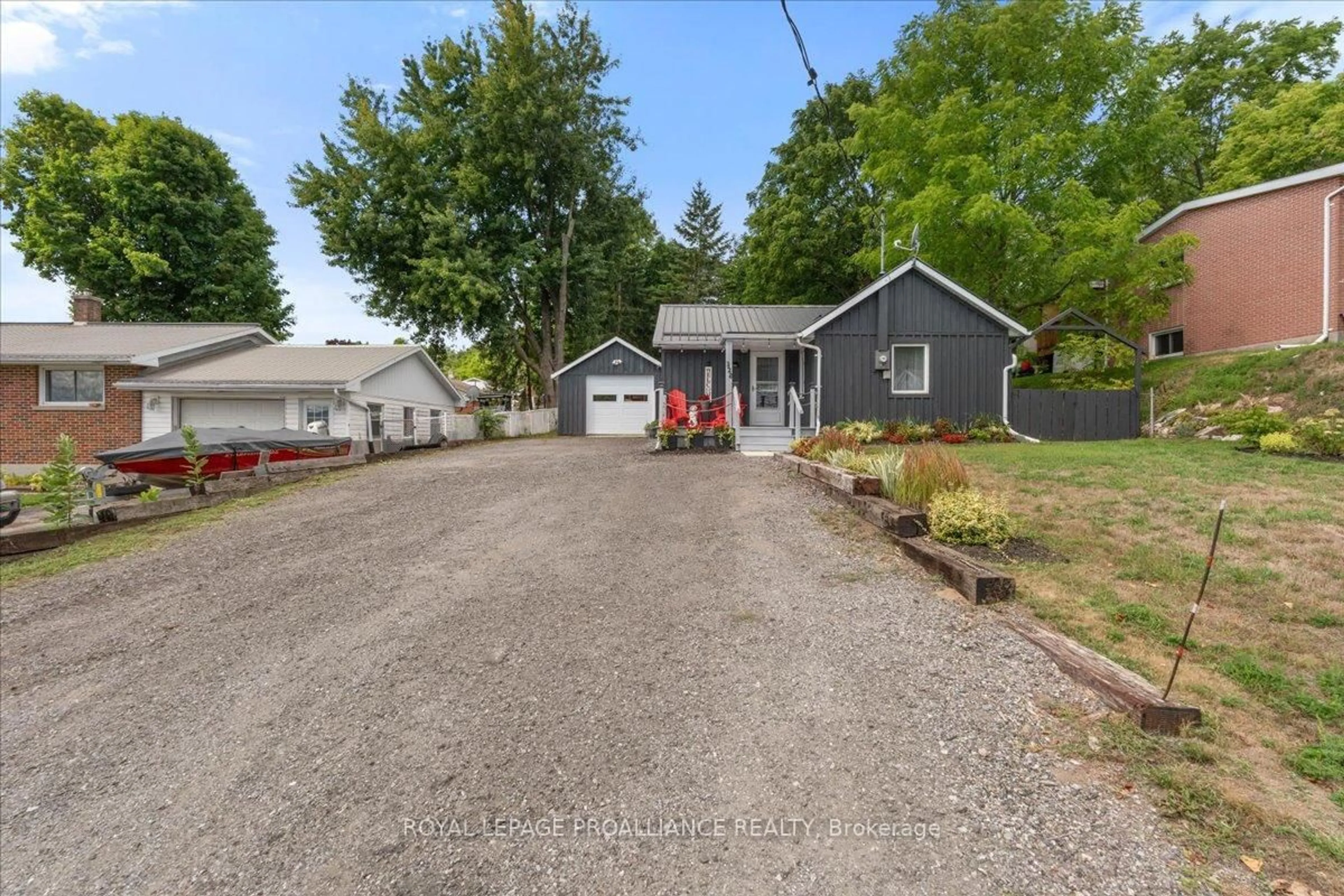 A pic from outside/outdoor area/front of a property/back of a property/a pic from drone, street for 328 Park Ave, Tweed Ontario K0K 3J0