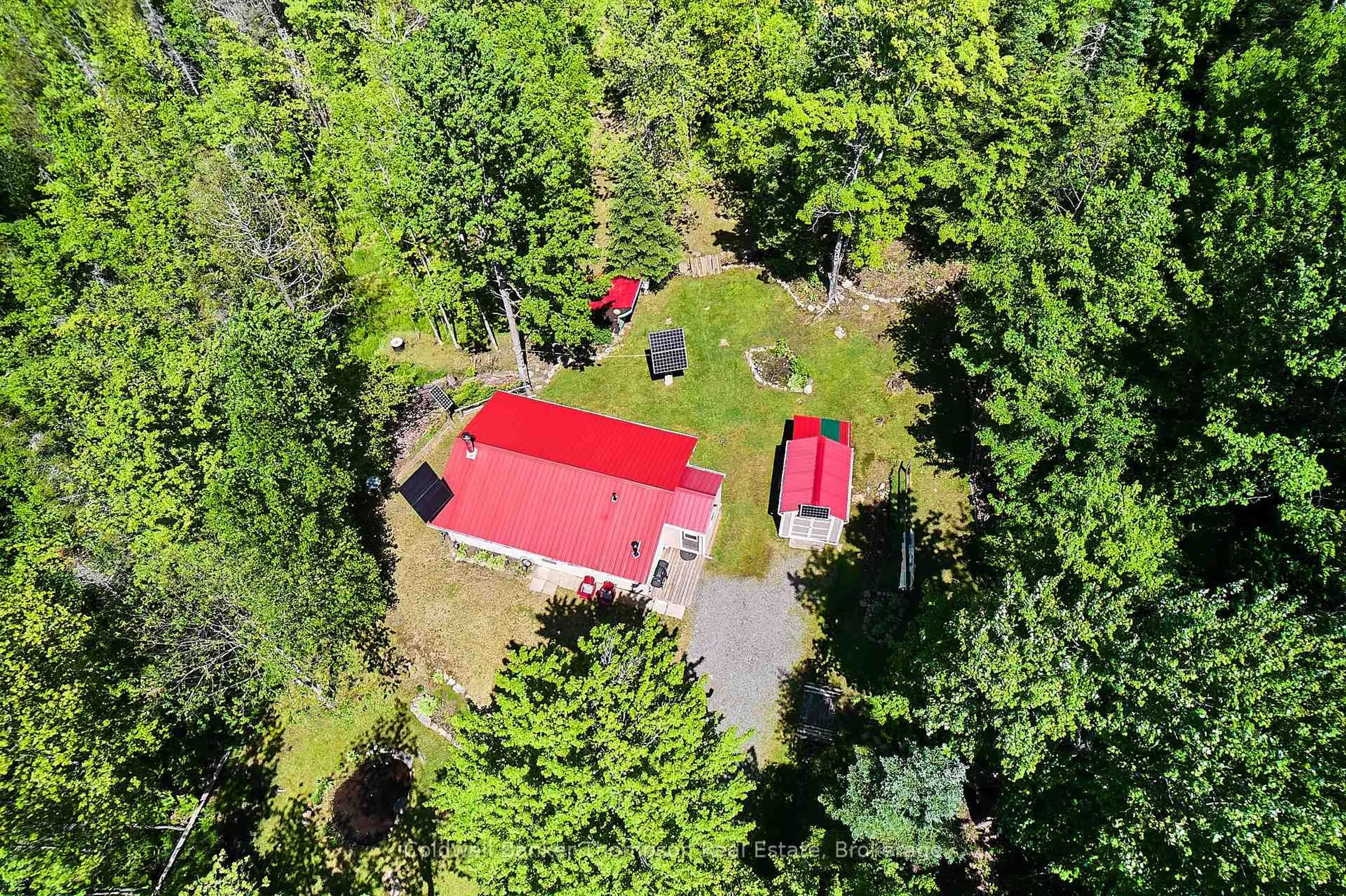 A pic from outside/outdoor area/front of a property/back of a property/a pic from drone, forest/trees view for 1022 Upper Walker Lake Rd, Lake of Bays Ontario P1H 2J6