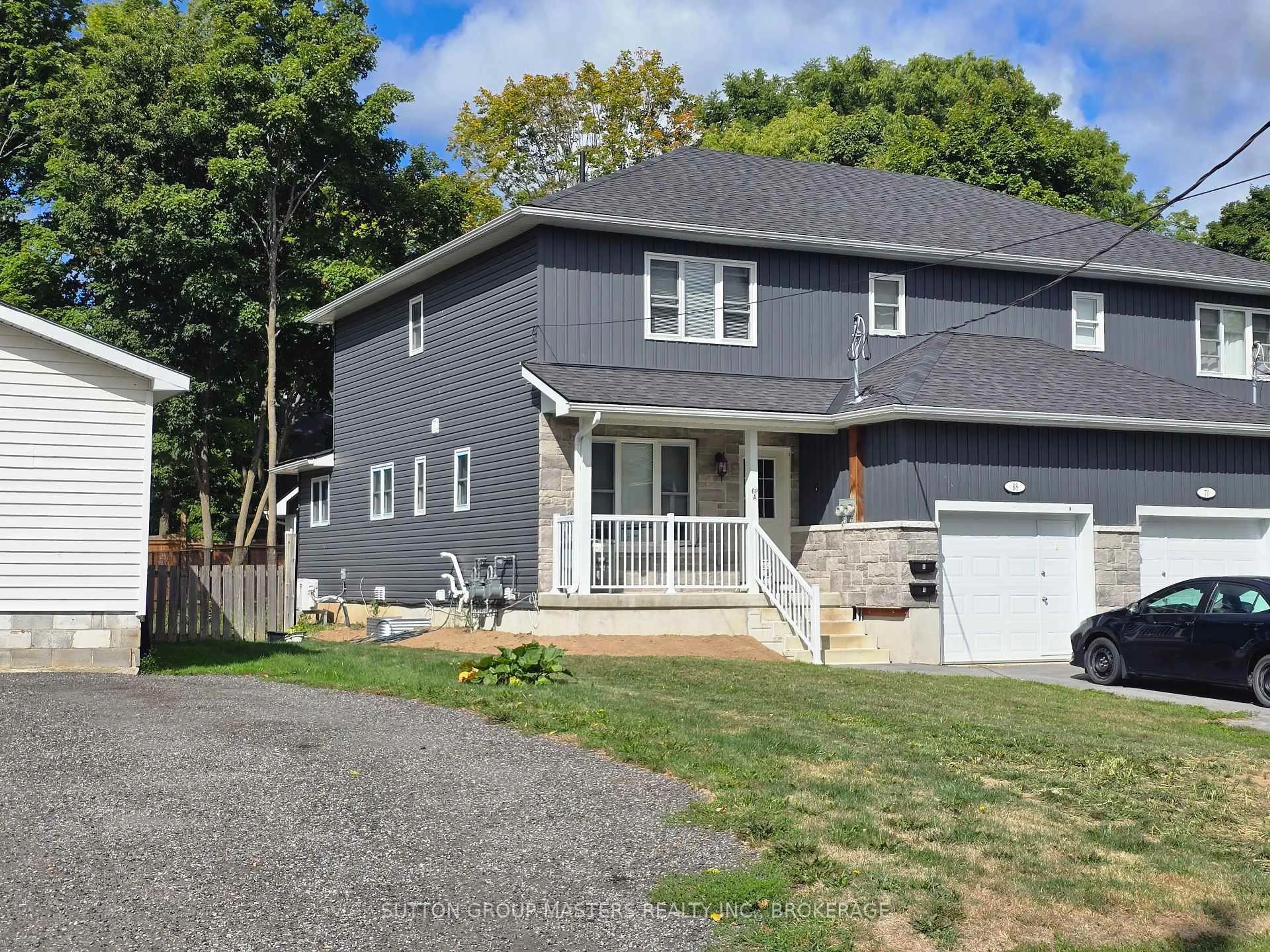 Home with vinyl exterior material, street for 68 Hickory St, Gananoque Ontario K7G 2P5