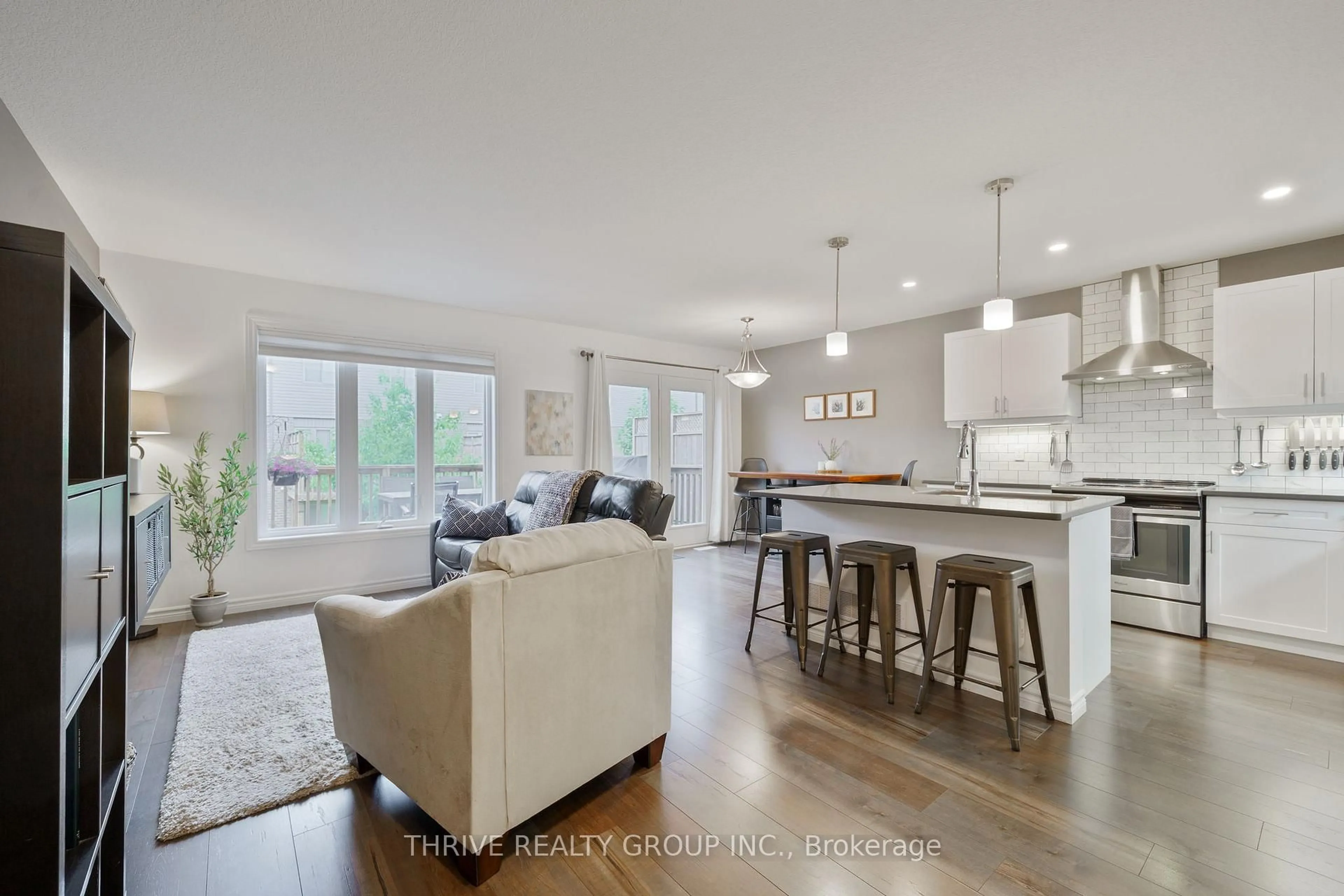 Open concept kitchen, wood/laminate floor for 3400 Castle Rock Pl #75, London South Ontario N6L 0E4