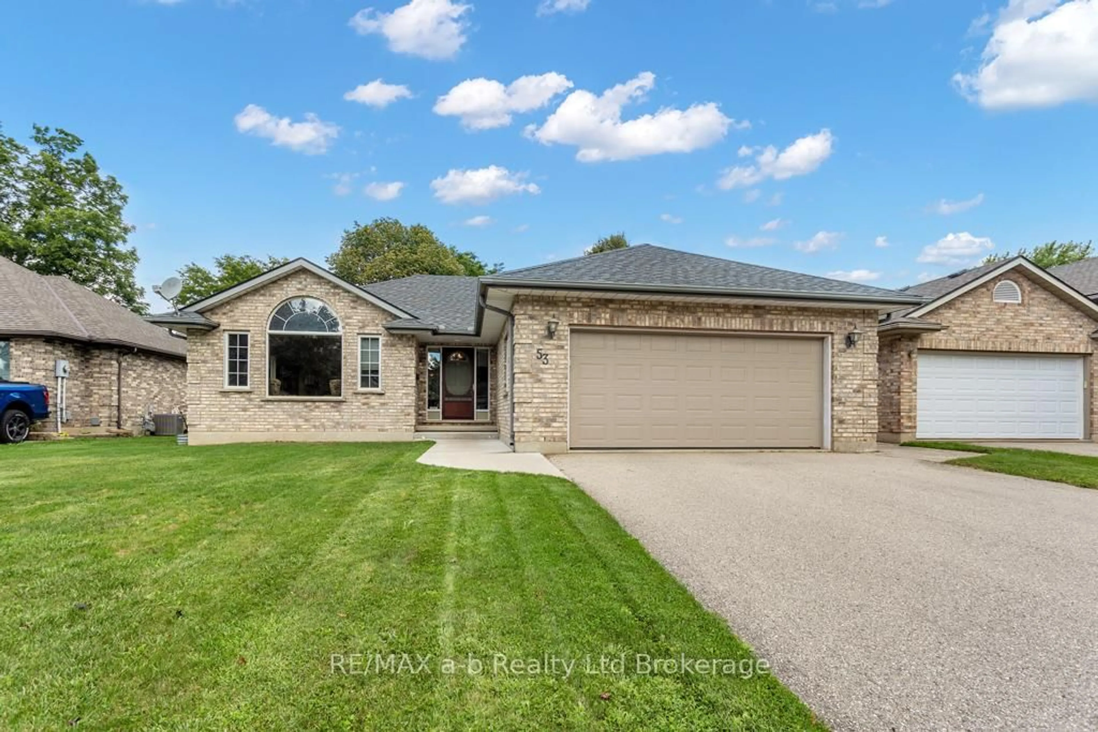 Home with brick exterior material, street for 53 Woodland Cres, Tillsonburg Ontario N4G 4G6