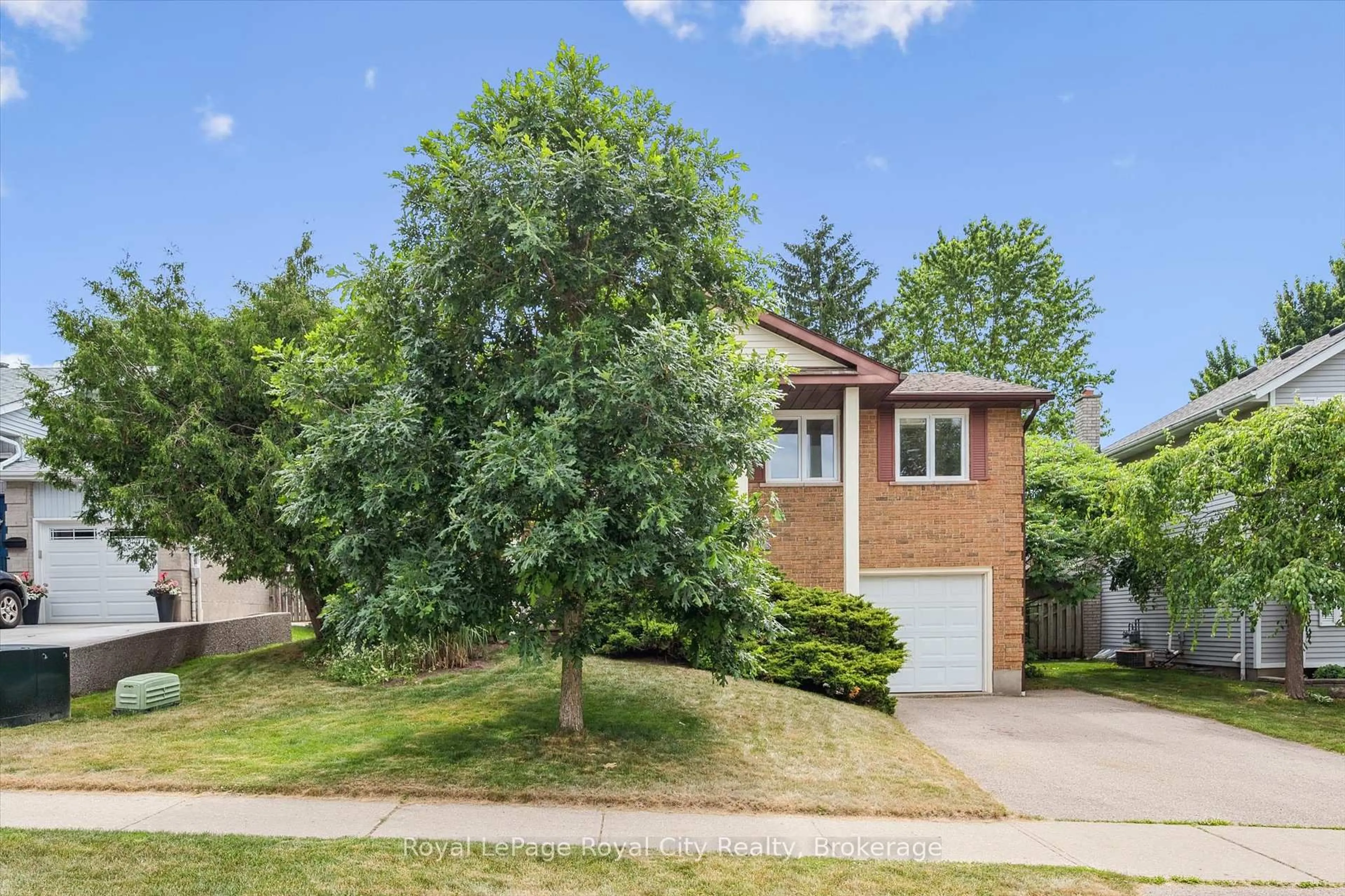 Home with brick exterior material, street for 9 Dunhill Cres, Guelph Ontario N1H 8A3