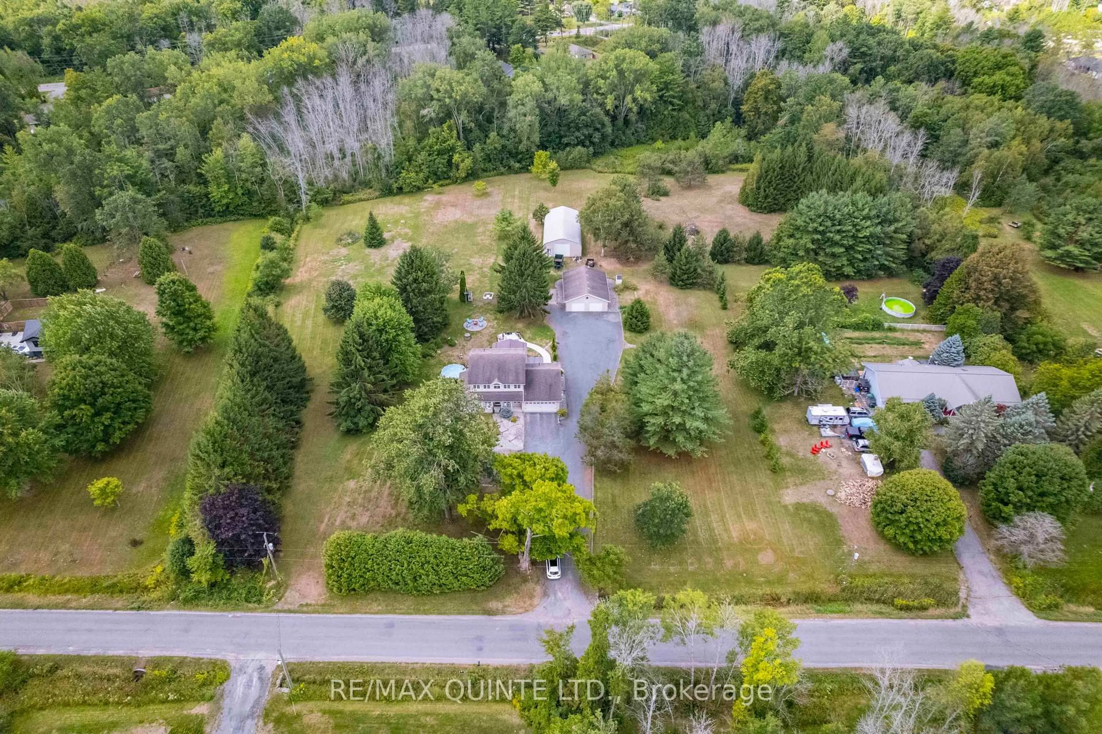A pic from outside/outdoor area/front of a property/back of a property/a pic from drone, forest/trees view for 143 Taft Rd, Prince Edward County Ontario K0K 1L0