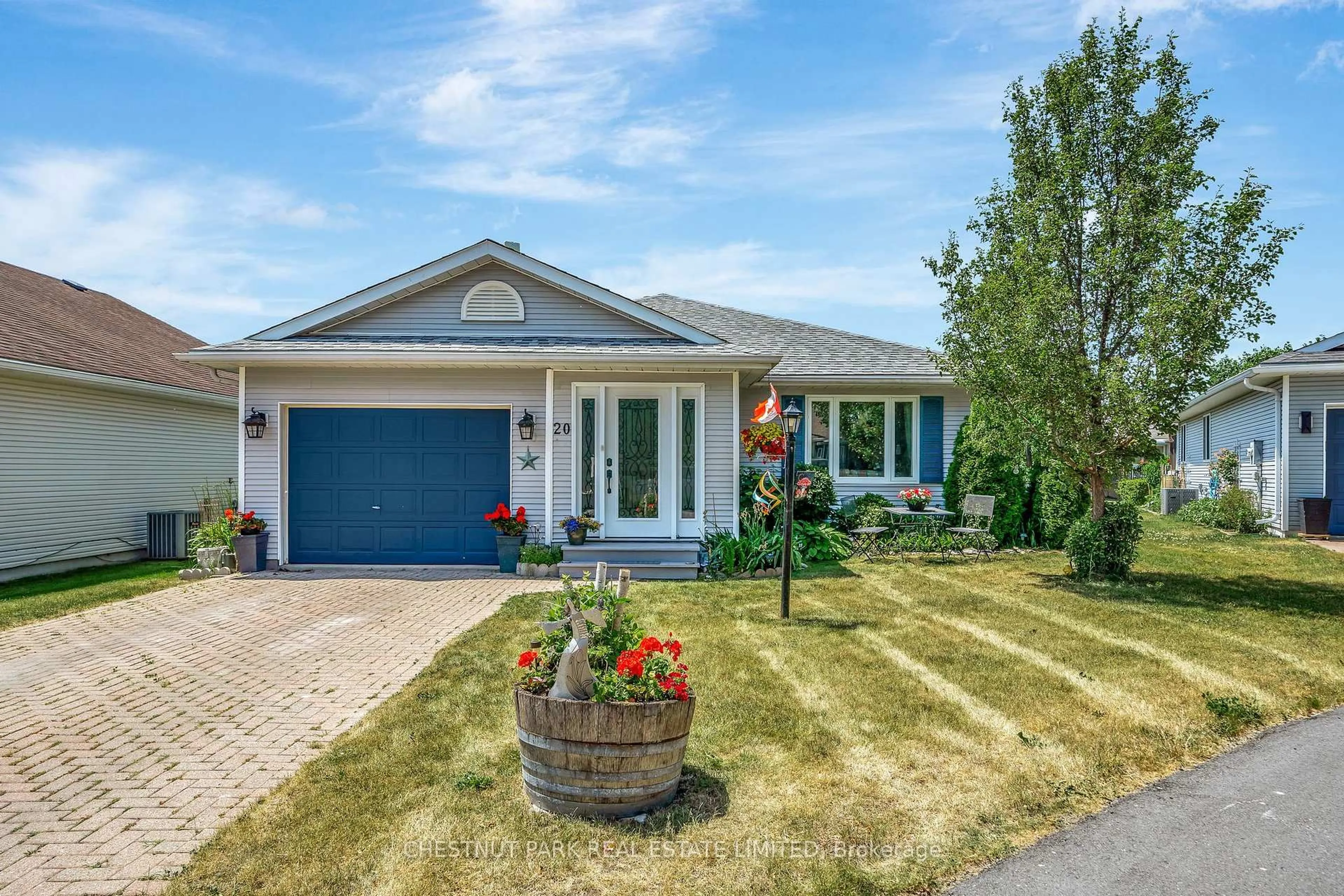 Home with vinyl exterior material, street for 20 Monroe Crt, Prince Edward County Ontario K0K 3L0