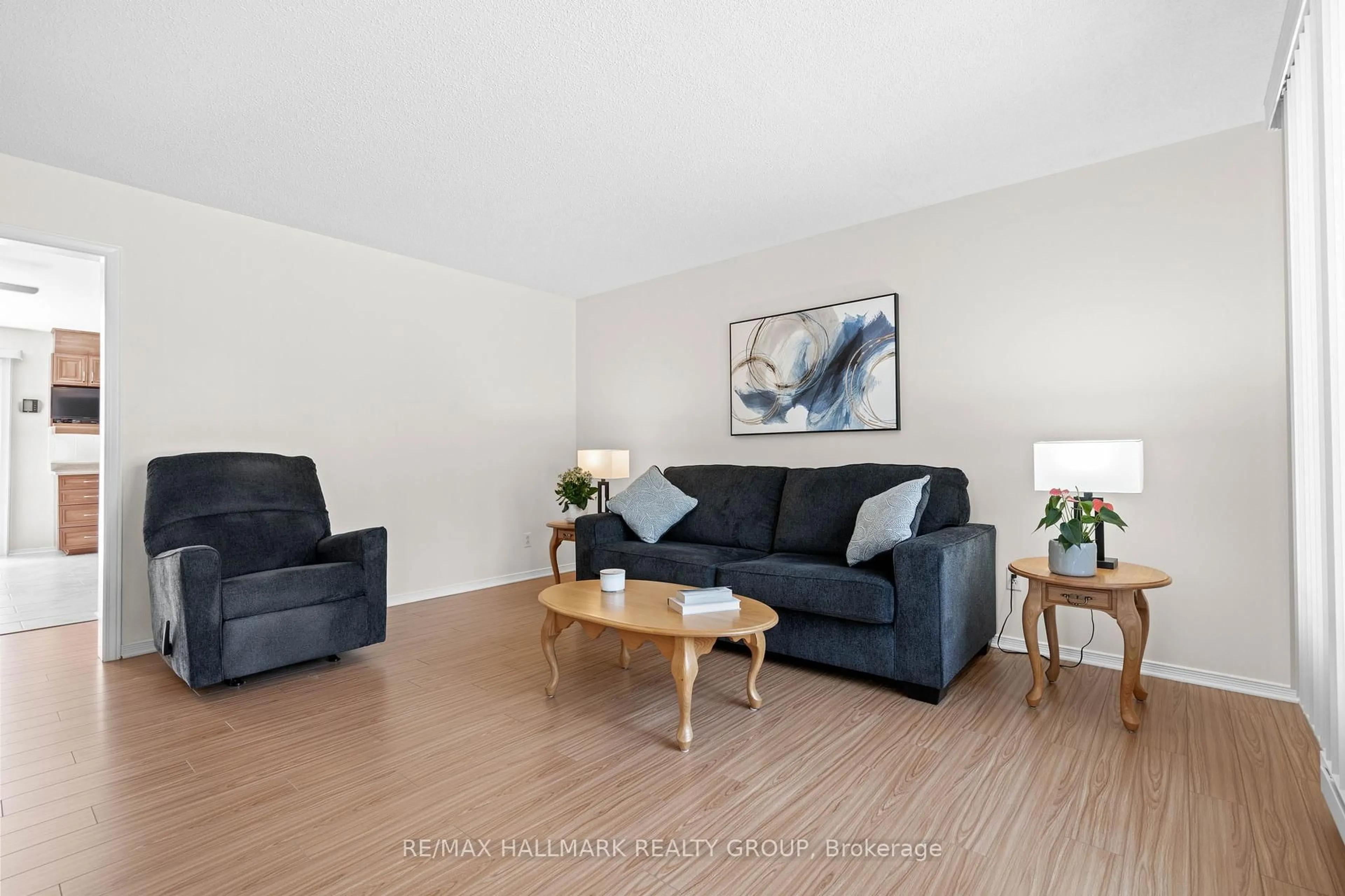 Living room with furniture, wood/laminate floor for 840 Du Golf Rd, Clarence-Rockland Ontario K0A 2A0