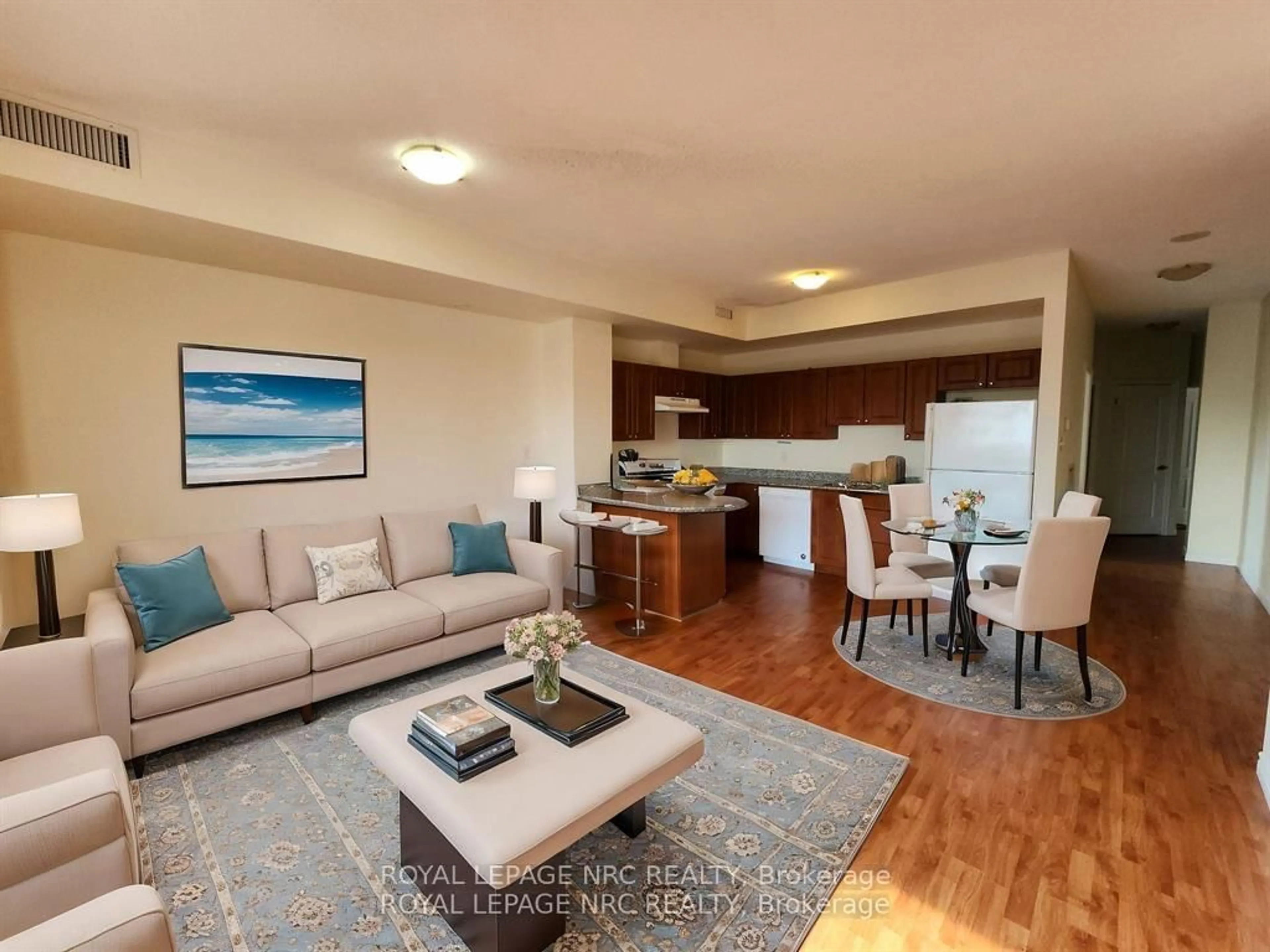 Living room with furniture, unknown for 135 JAMES St #812, Hamilton Ontario L8P 2Z6