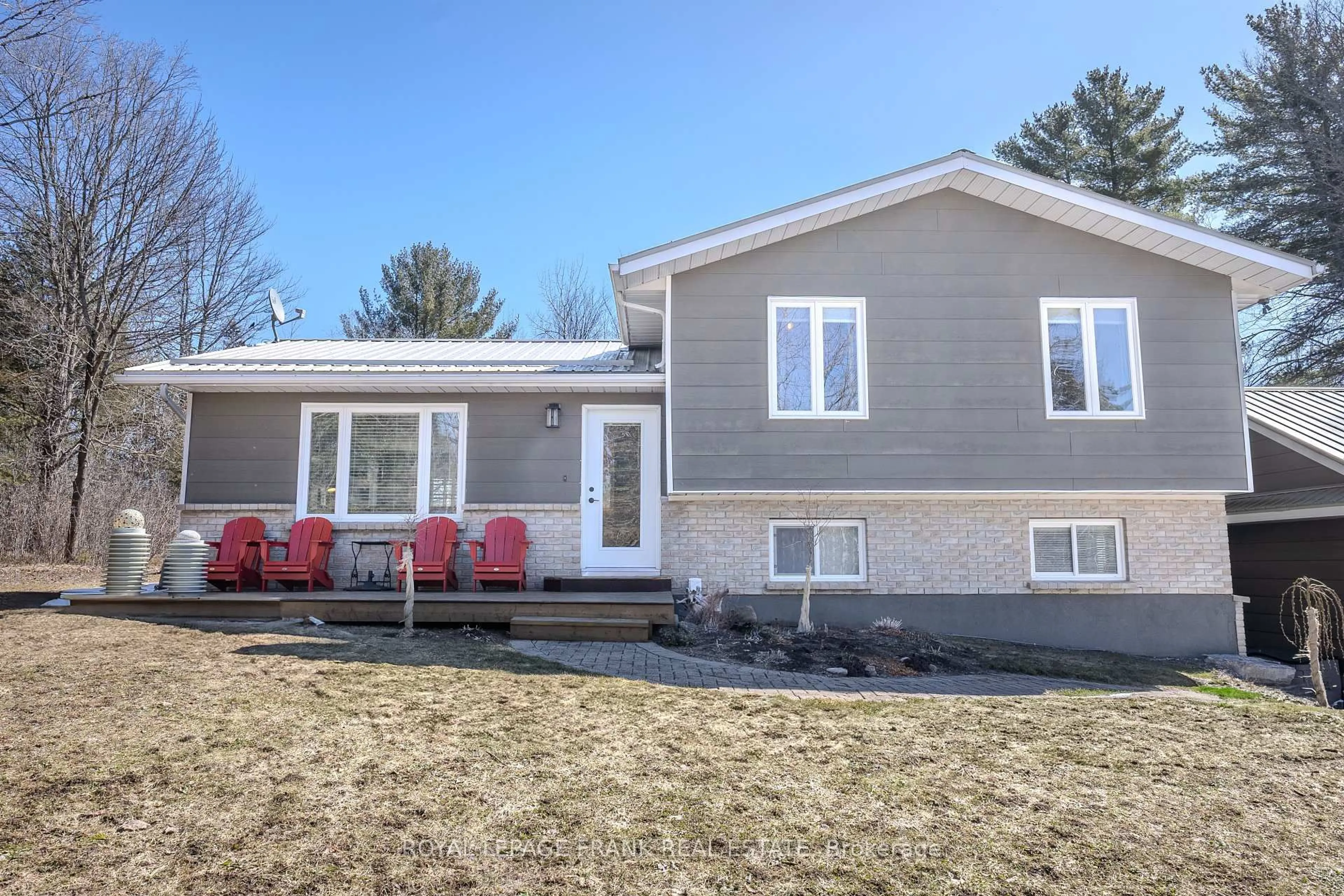 Home with vinyl exterior material, street for 94 County Road 36, Trent Lakes Ontario K0M 1A0