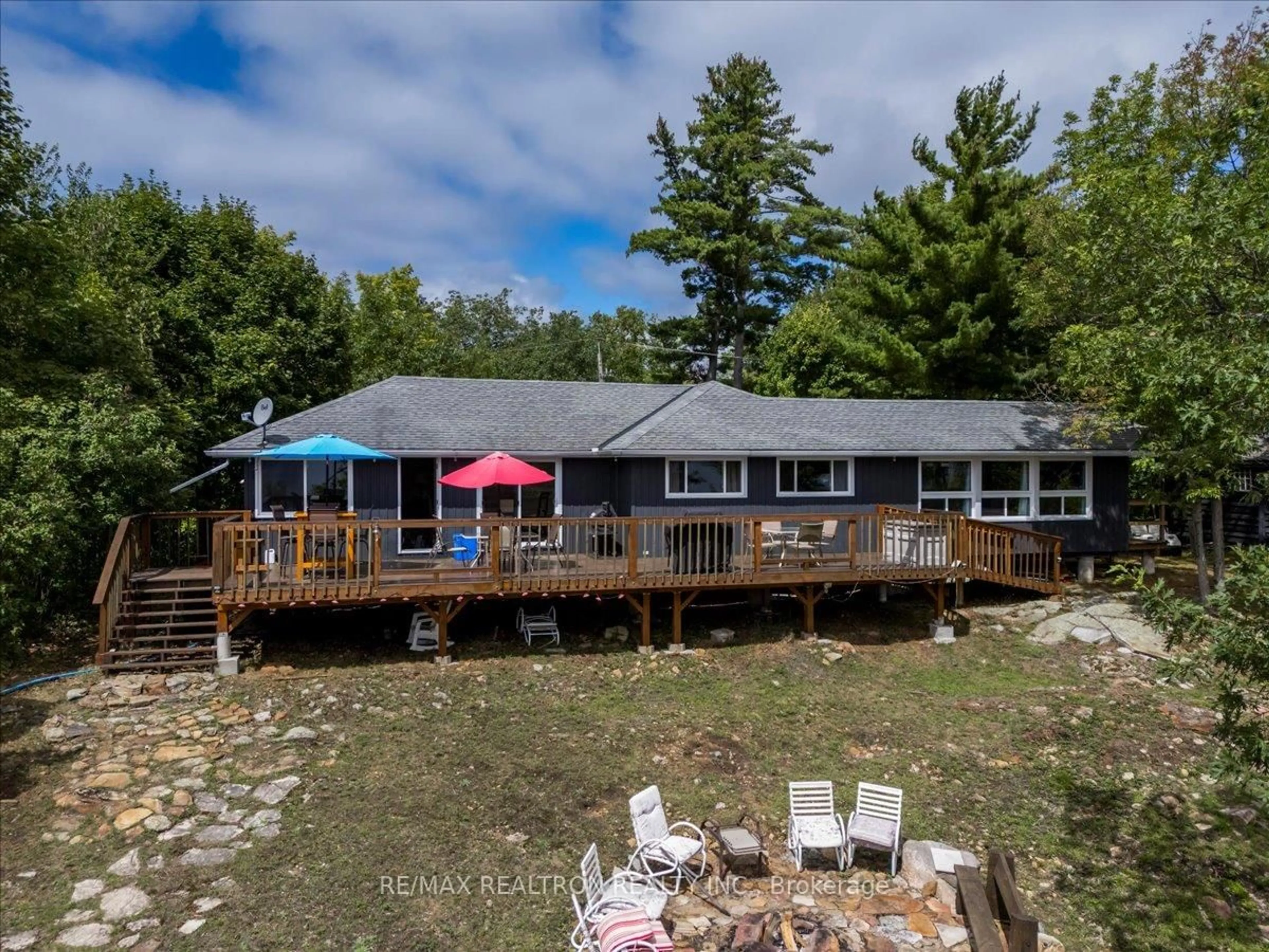 A pic from outside/outdoor area/front of a property/back of a property/a pic from drone, water/lake/river/ocean view for 9268 Georgian Bay Shore, Georgian Bay Ontario P0E 1E0