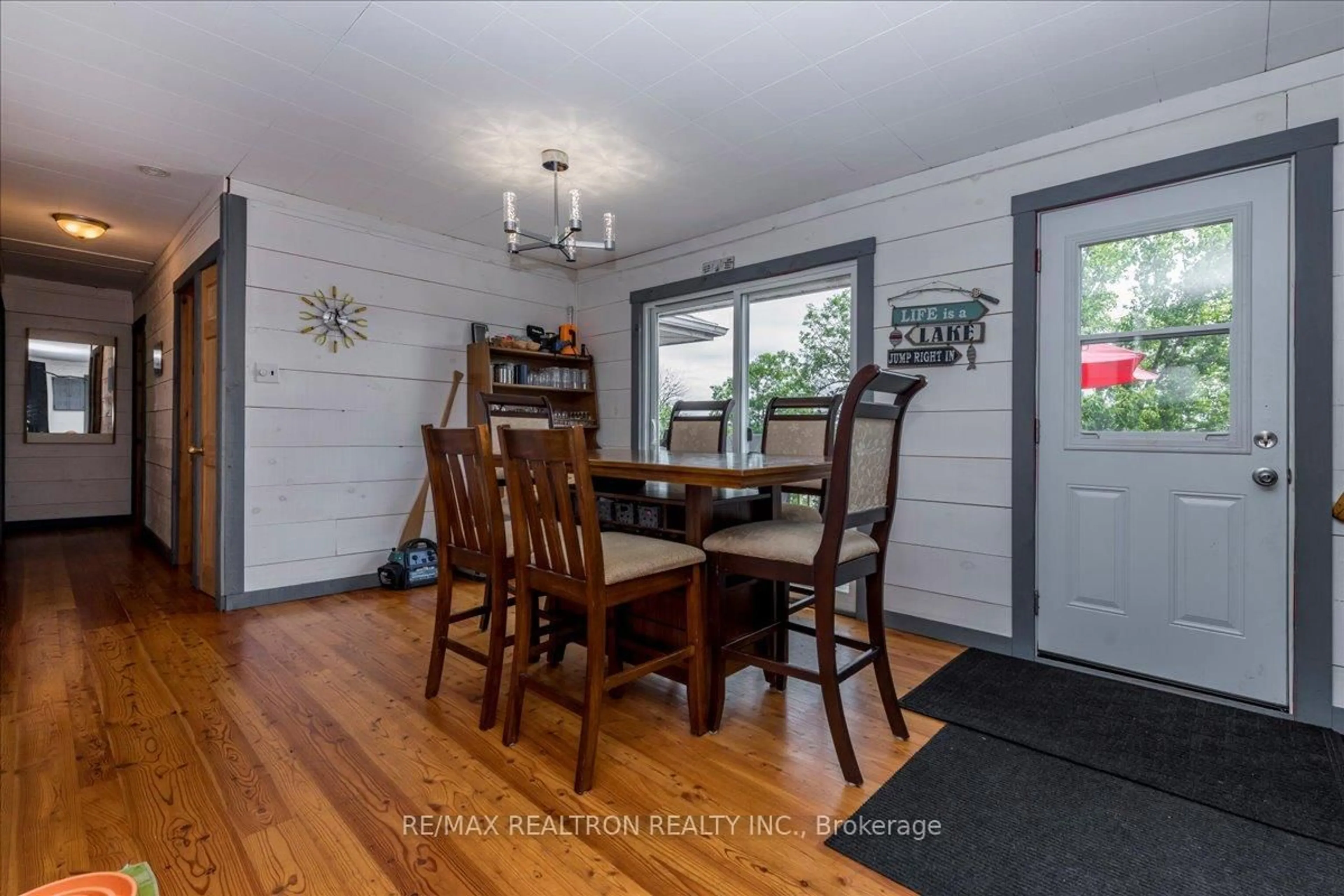 Dining room, wood/laminate floor for 9268 Georgian Bay Shore, Georgian Bay Ontario P0E 1E0