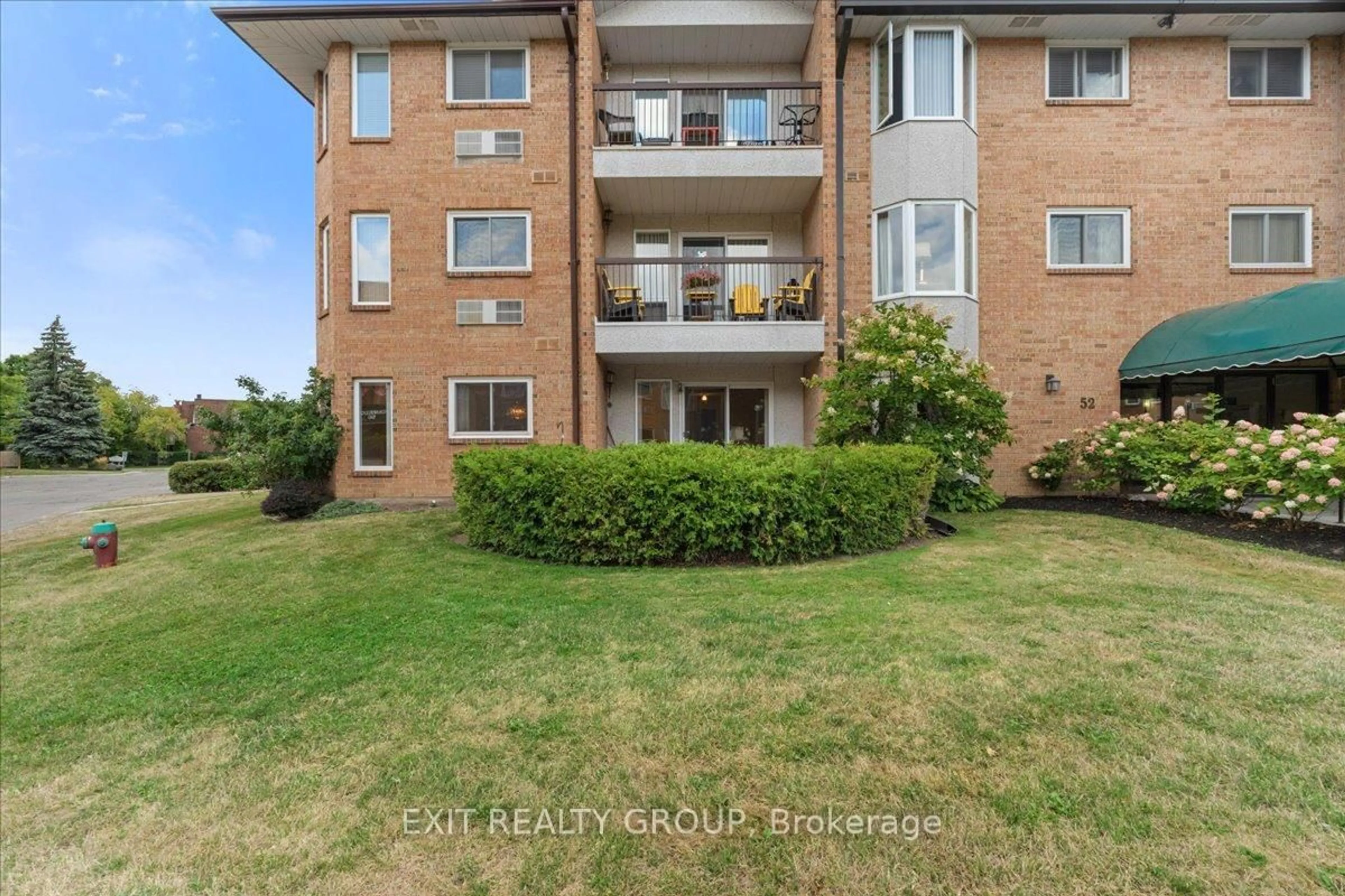 A pic from outside/outdoor area/front of a property/back of a property/a pic from drone, unknown for 52 Tripp Blvd #117, Quinte West Ontario K8V 5V1