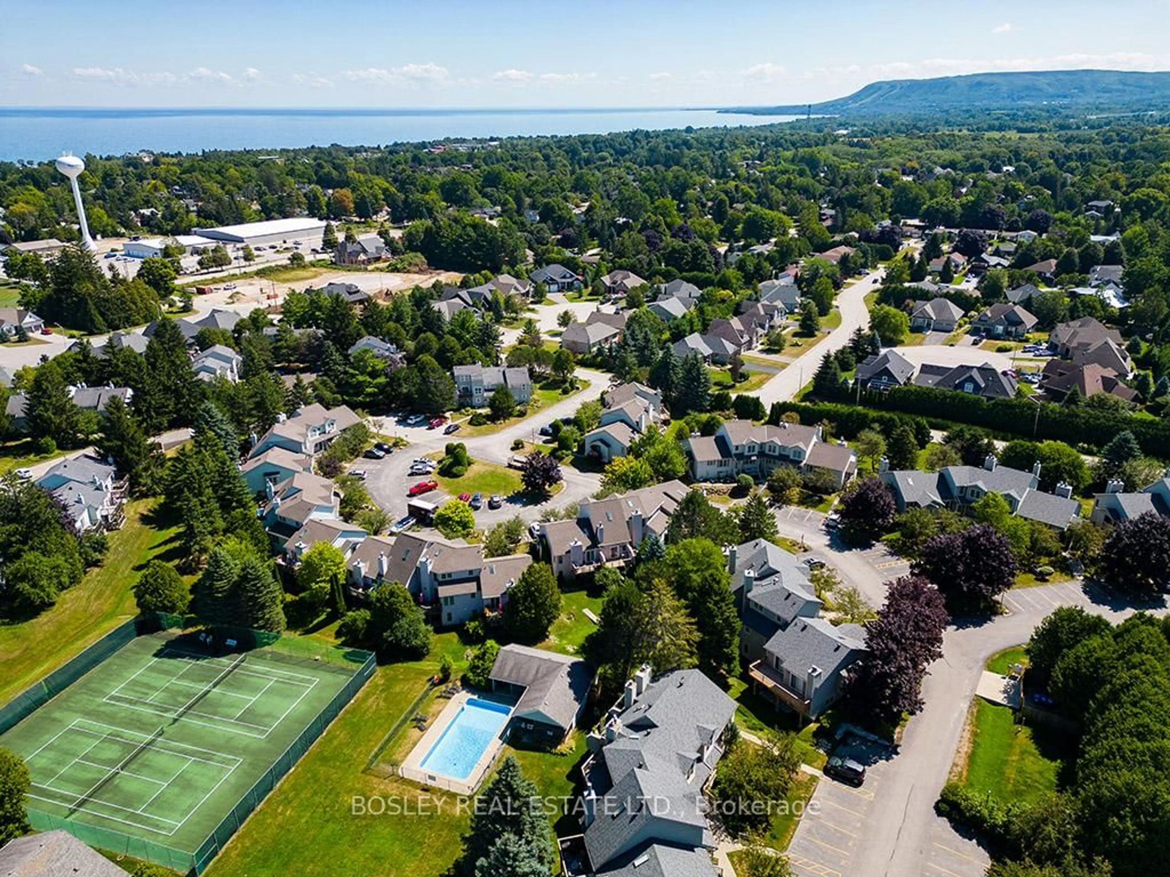 A pic from outside/outdoor area/front of a property/back of a property/a pic from drone, water/lake/river/ocean view for 150 Victoria St #113, Blue Mountains Ontario N0H 2P0
