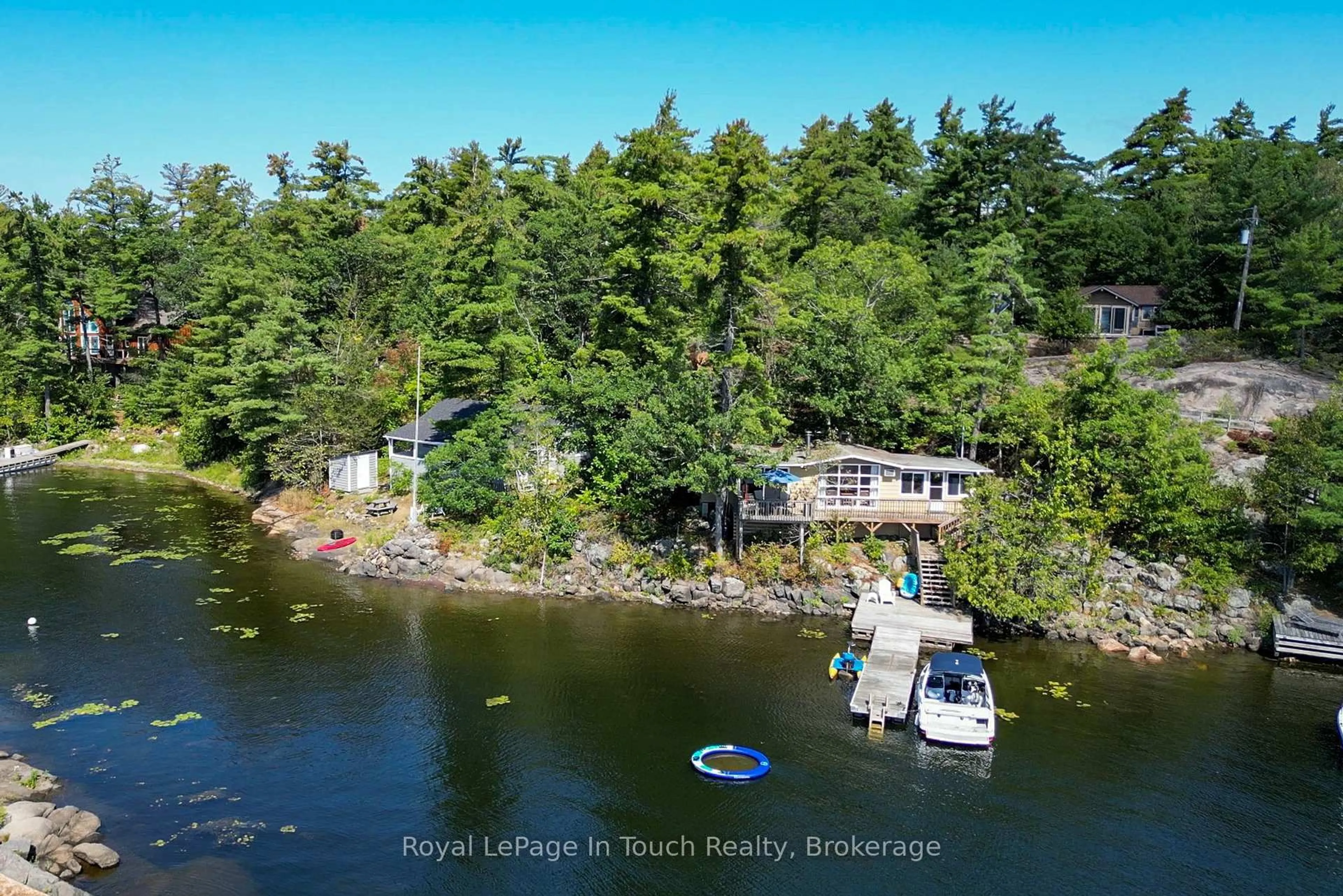 A pic from outside/outdoor area/front of a property/back of a property/a pic from drone, water/lake/river/ocean view for 13182 Georgian Bay Shore, Georgian Bay Ontario P0E 1E0